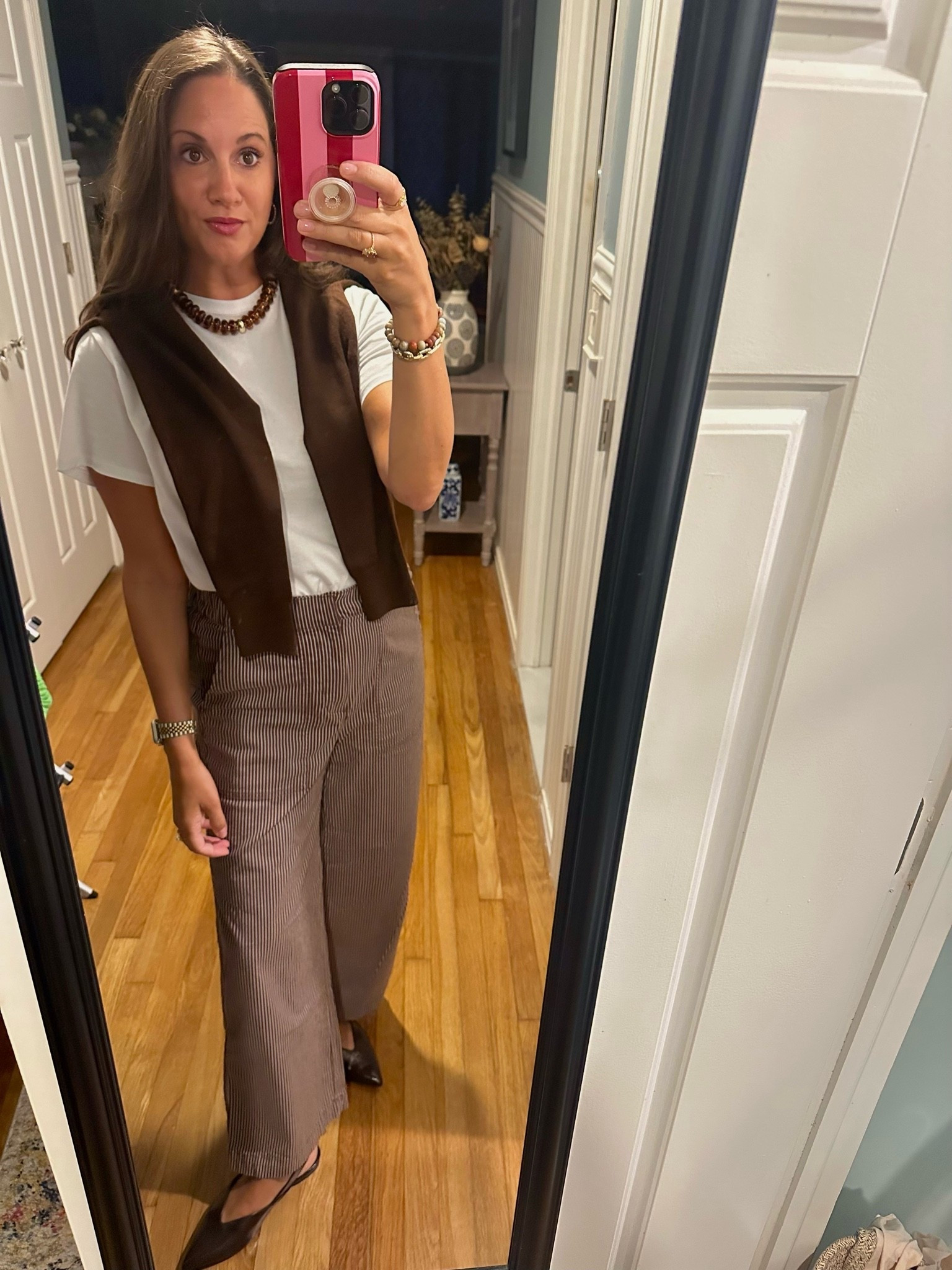 Back in the office wearing my favorite #Gap pants, a simple white tee and a cardigan for the inevitable office AC freeze out. Slingbacks are from last year / Old Navy 🤎

#LTKootd #LTKWorkwear #LTKOver40