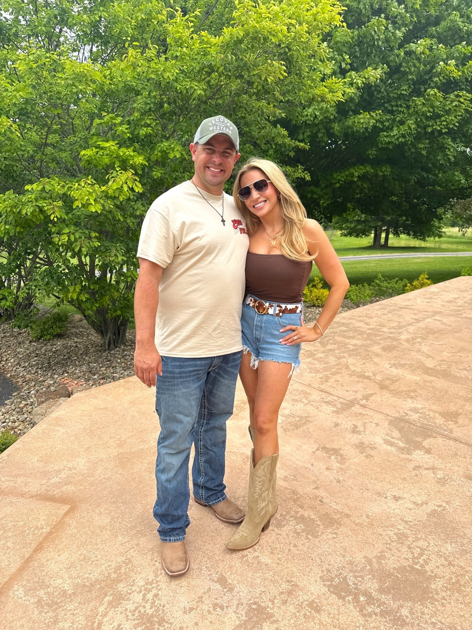 Country concert outfit Morgan wallen concert ootd look Levi denim shorts cow print belt suede western cowgirl cowboy  boots

#LTKootd