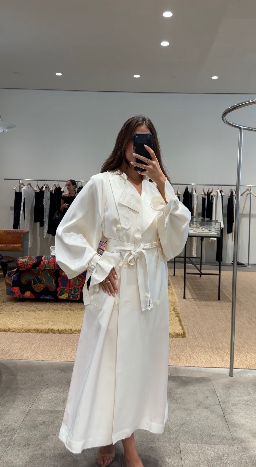 Creamy dream ✨ The trench coat of the season. This Toteme moment feels so elevated and effortless — from the oversized sleeves to the perfectly draped silhouette. The ultimate luxe layering piece for summer nights, summer travel and chic everyday styling.

summer outfits
summer travel
white trench coat
date night outfits
lightweight coat 

 #LTKgrwm #LTKootd #LTKSeasonal