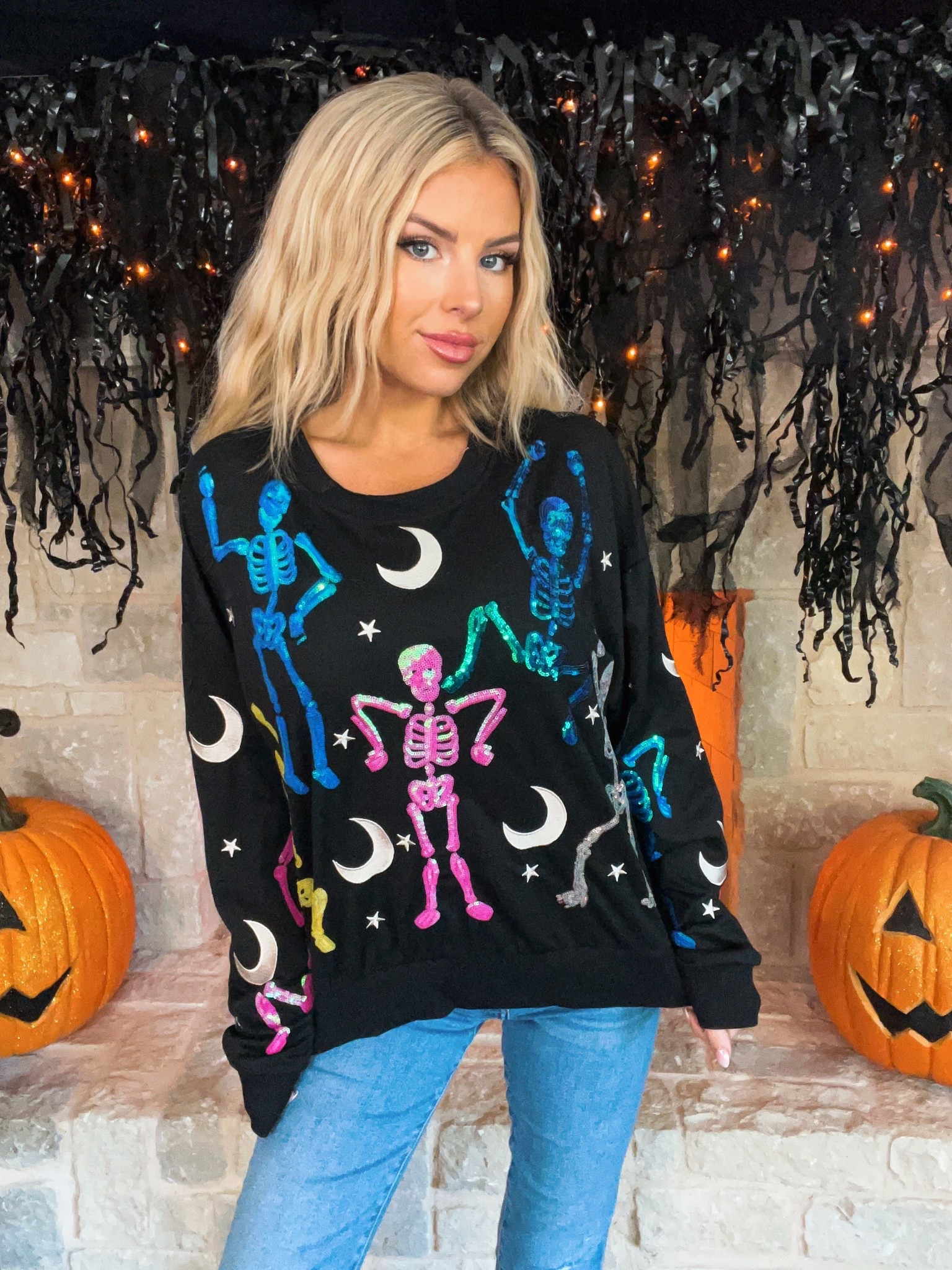 Amazon Halloween sweater. Queen of sparkles 