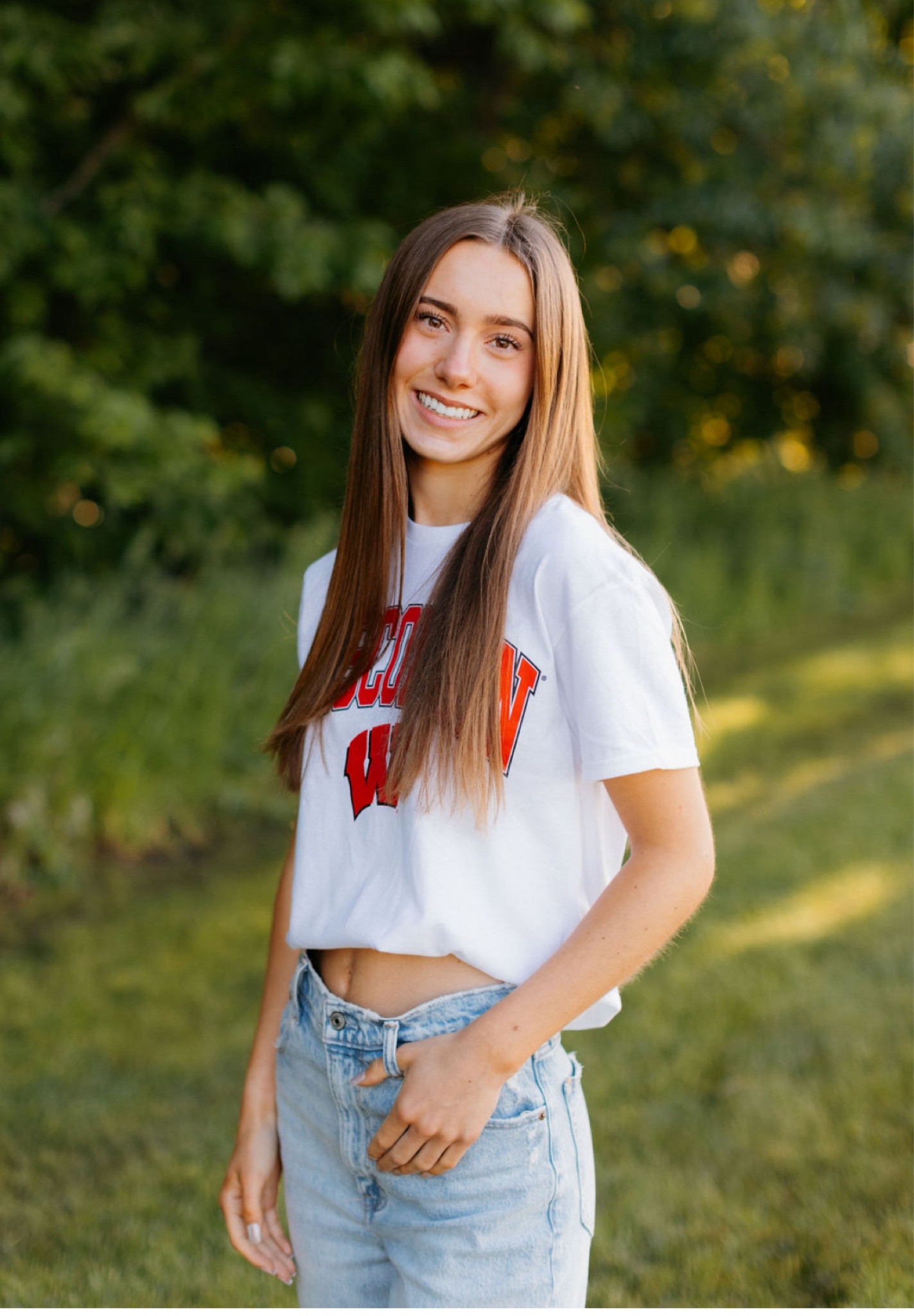Wisconsin Badgers 
Shirt - true to size 
Jeans - true to size 
Shoes - true to size 

#LTKFindsUnder100