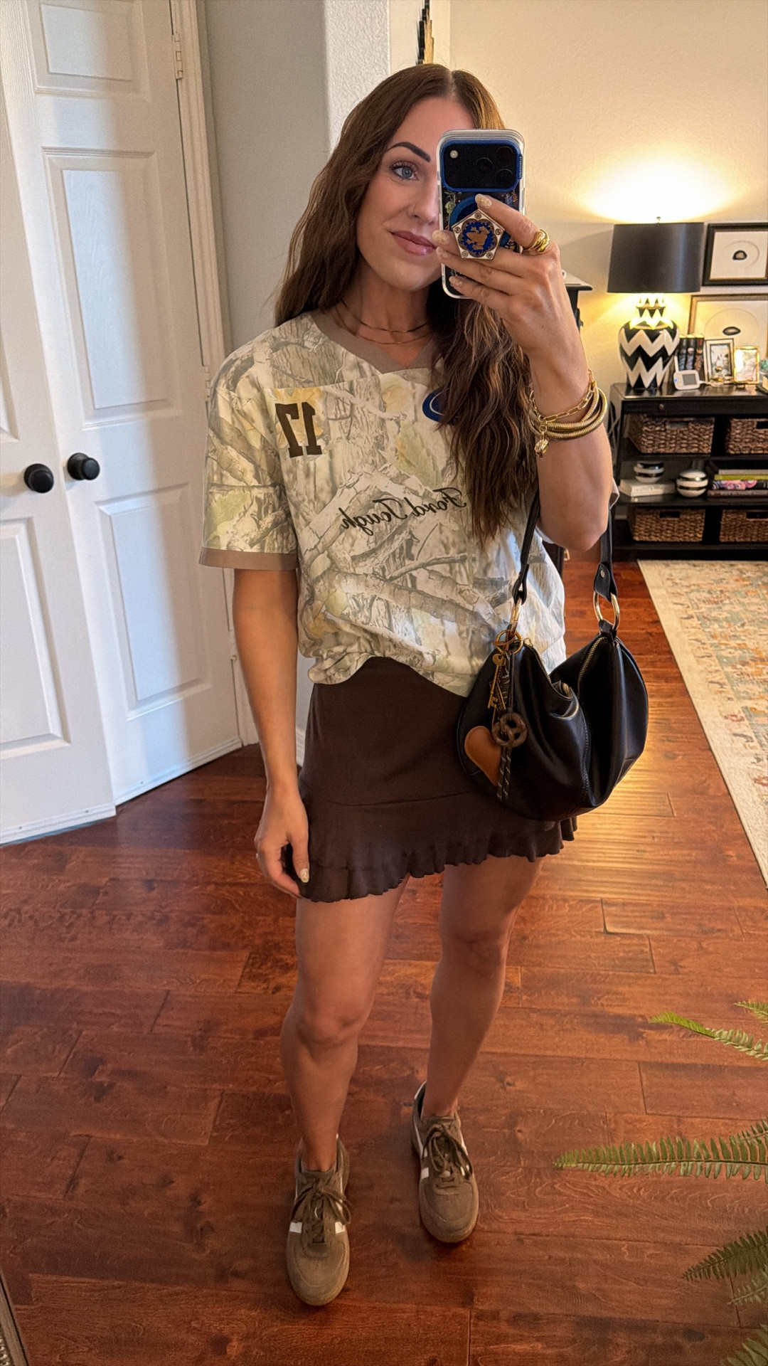 Casual date night outfit transitional fall outfit inspo target graphic tee and skort free people gola sneakers chocolate suede

#LTKStyleTip #LTKFindsUnder50 #LTKShoeCrush