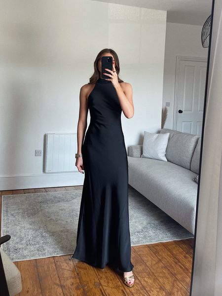 Wearing a size 8 in the warehouse black satin maxi dress halter neck 
I’m 5ft 6 
EMILY20 for an extra 20% off 

Wedding guest outfit inspiration black dress occasion-wear 