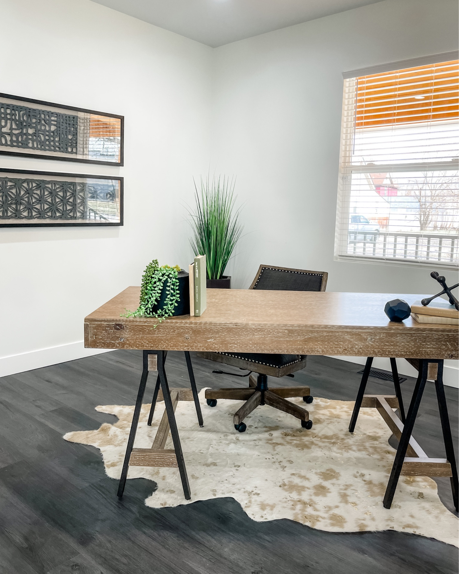 A welcoming home office! We styled it using warmer tones and a pop of color with greenery.

#LTKhome #LTKstyletip #LTKfamily
