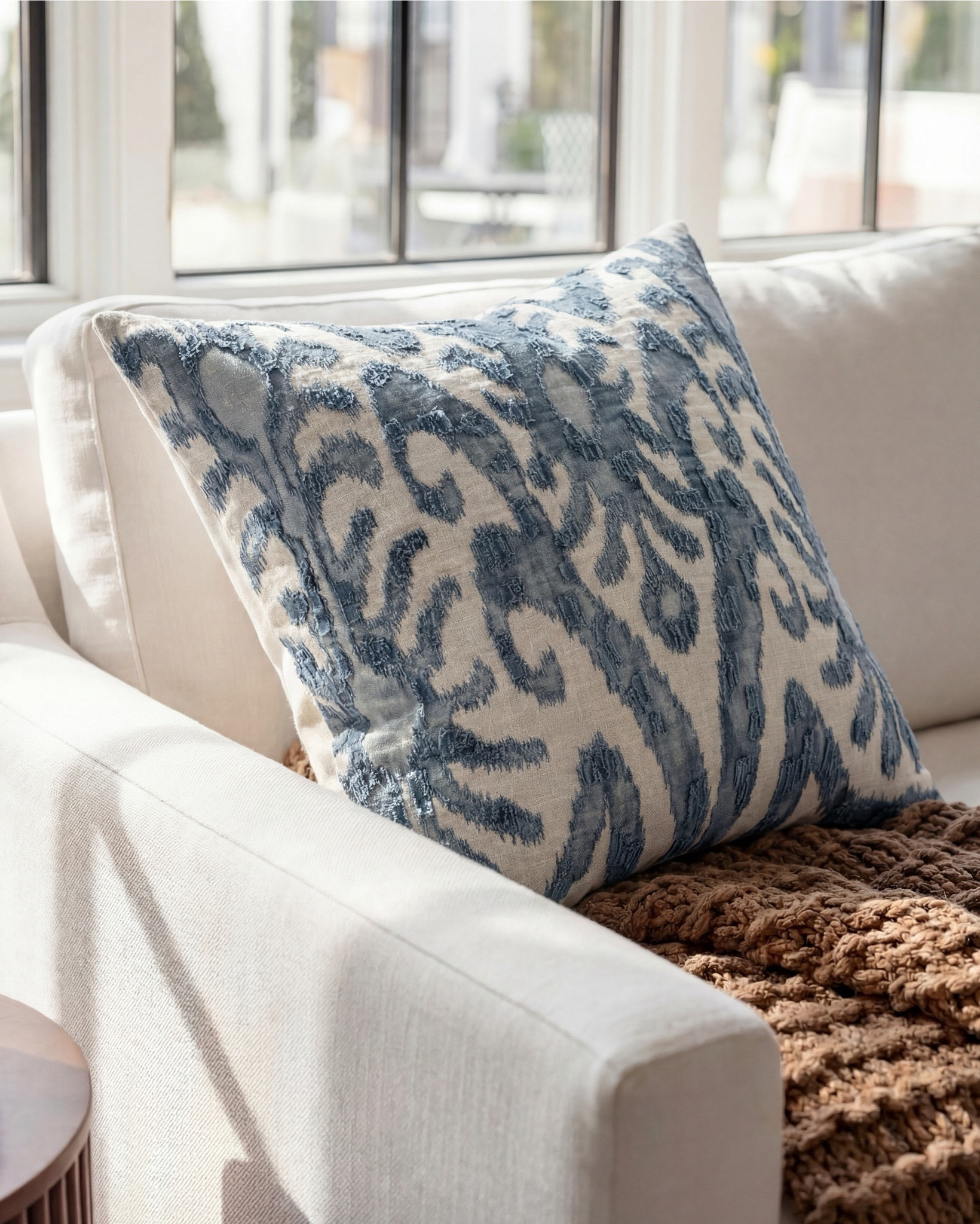 Shop the Look:
• Cream upholstered sofa (clean modern lines)
• Wood frame accent chairs with light neutral cushions
• Warm brown boucle cube ottomans
• Medium wood square coffee table
• Blue and beige vintage-style area rug
• Marble fireplace surround (white with soft veining)
• Dark wood ceiling beams
• Round wood fluted side tables
• Small ceramic table lamps (warm neutral base)
• Blue ceramic decorative vase
• Neutral textured throw blanket (warm brown)
• Blue linen accent pillows
• Floating wood wall shelves
• Wood storage cabinet with brass bird knobs
• Abstract neutral wall art (warm brown tones)
• White globe pendant light

#LTKhome #LTKsale #LTKstyletip