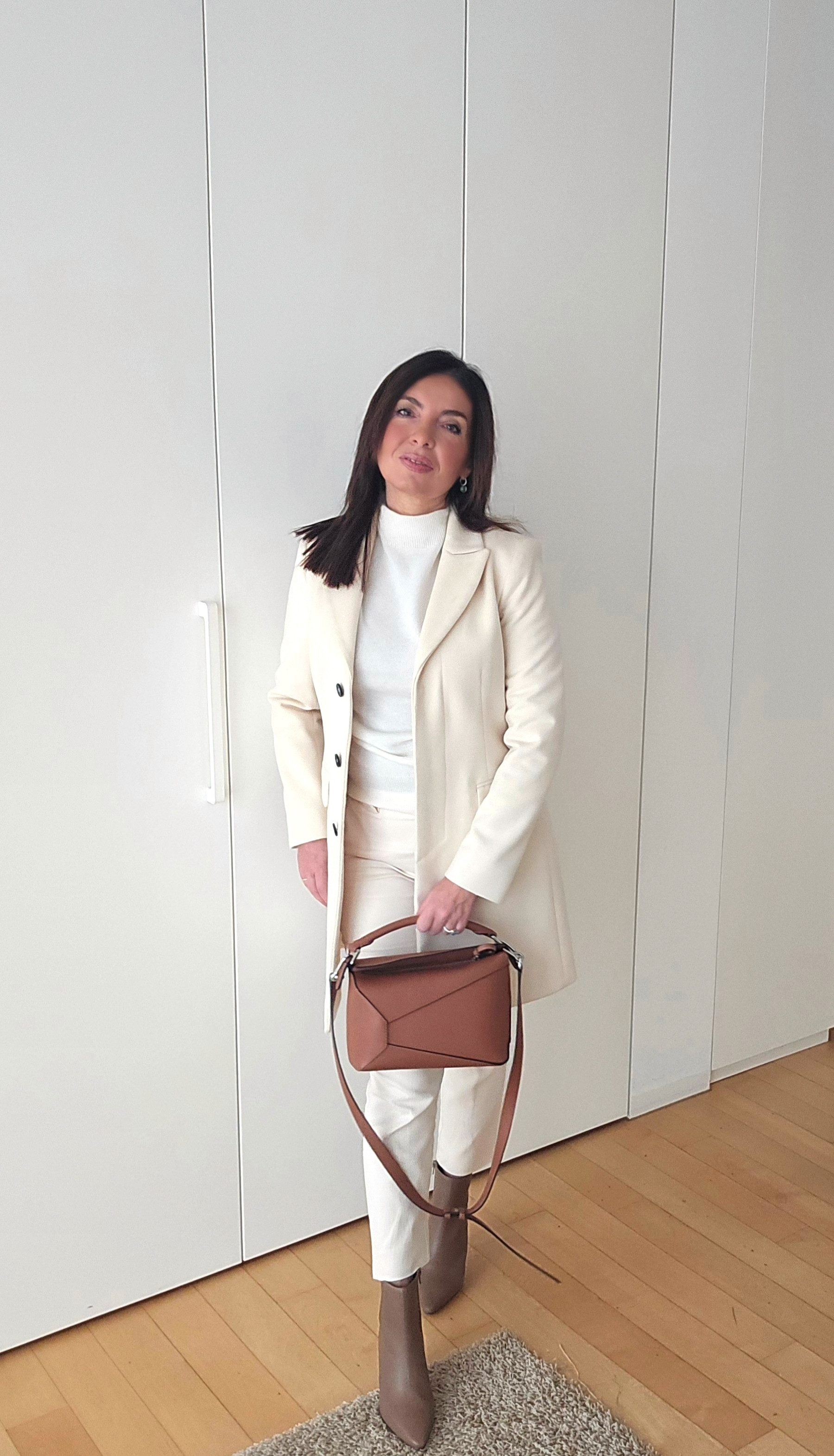 mix of beige, cream, and tan tones – perfect for a cozy yet stylish look! Embrace the trending neutral layering vibe this season and elevate your wardrobe with timeless pieces that scream elegance. Add a touch of warmth with oversized knitwear and pair it with structured accessories for a balanced aesthetic. #WinterFashion2025 #NeutralStyle #ChicAndCozy  

 #LTKitalia #LTKeurope #LTKwinter