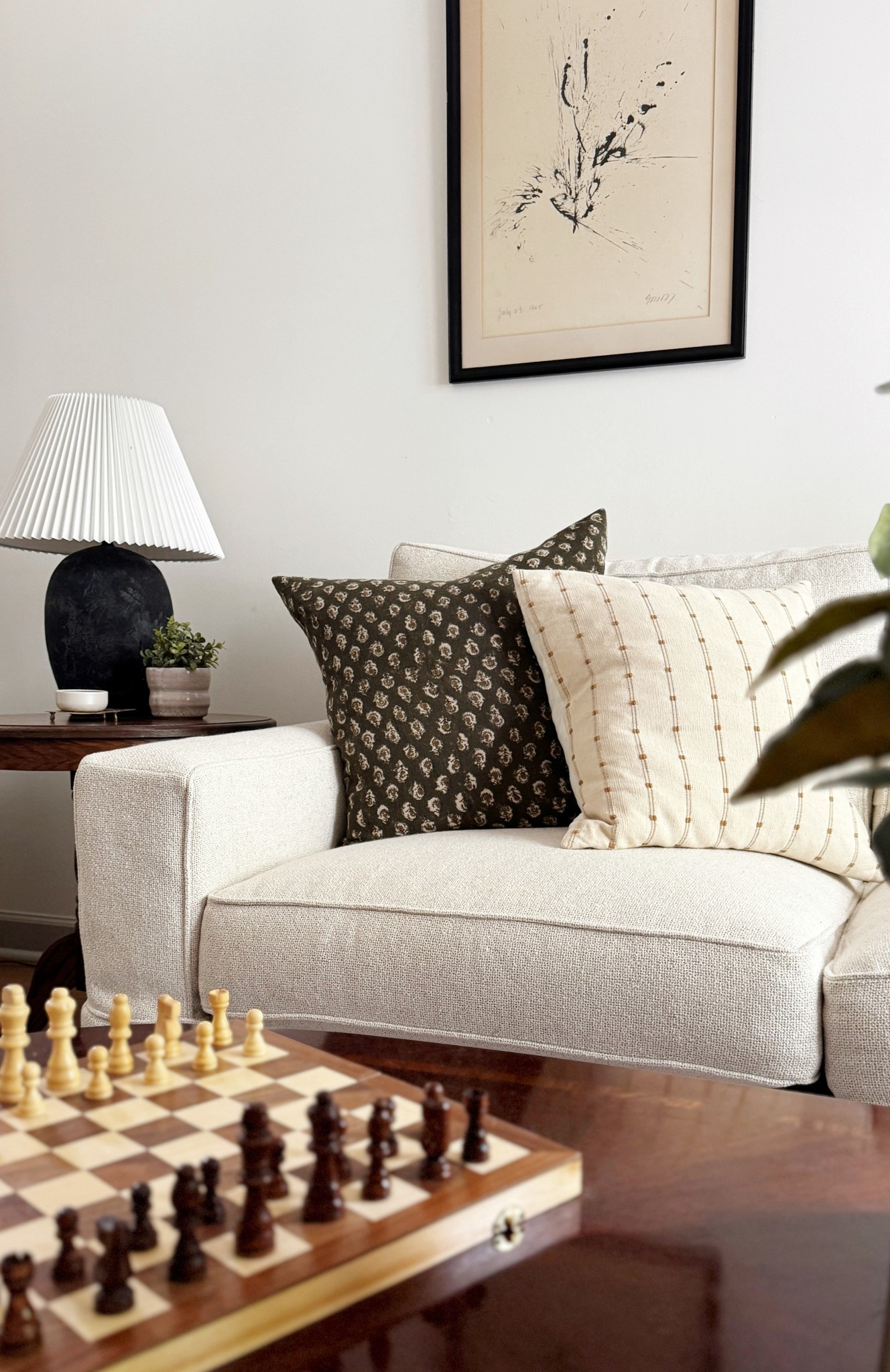 Brown pillows / white square arm sofa / neutral living room/ pleated lampshade  

#LTKHome