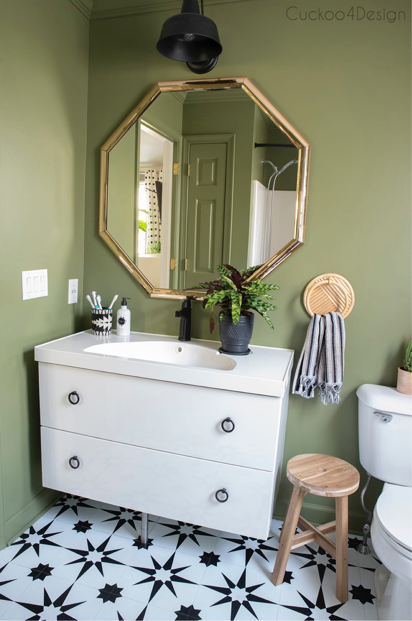 Still loving my green bathroom with the black and white floor tiles and accessories #bathroomdecor #tiles #peelandsticktile

#LTKstyletip #LTKhome