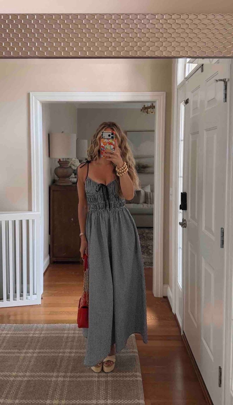 the easiest throw-on-and-go summer dress that still looks put together. Lightweight, flattering, and perfect for everything from errands to dinner. Paired with neutral slides + a pop of red for a little moment ❤️

gingham dress, summer dress outfit, midi dress, casual chic outfit, everyday outfit idea, neutral sandals, red handbag, effortless style, warm weather outfit, feminine summer look

#LTKgrwm #LTKdayinmylife #LTKootd