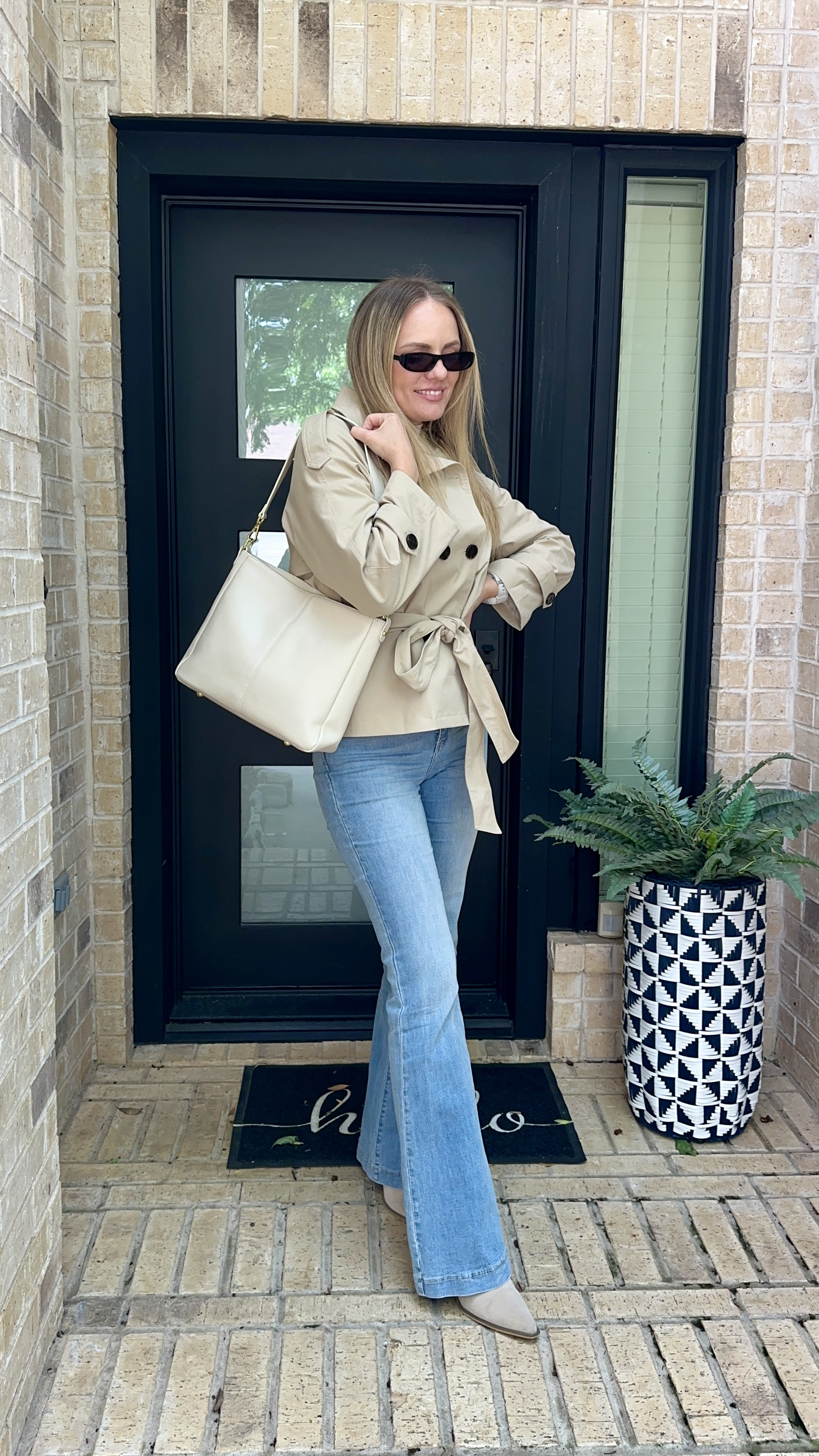
Classic, effortless, and on repeat lately 🤍 It’s the kind of outfit that works for school drop-off, errands, lunch, all of it.

Neutral trench coat, flare jeans, everyday outfit, casual chic style, fall outfit idea, mom style, neutral outfits, easy everyday fashion ✨ 

 #LTKgrwm #LTKootd #LTKmomlife