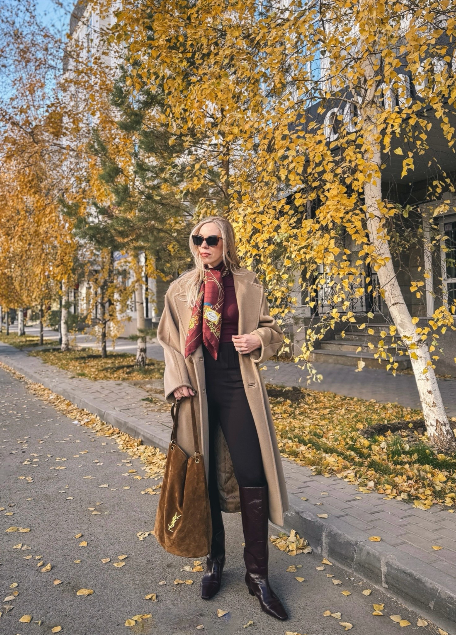 Classic fall outfit with camel coat, dark brown leggings, burgundy boots, Gucci silk scarf