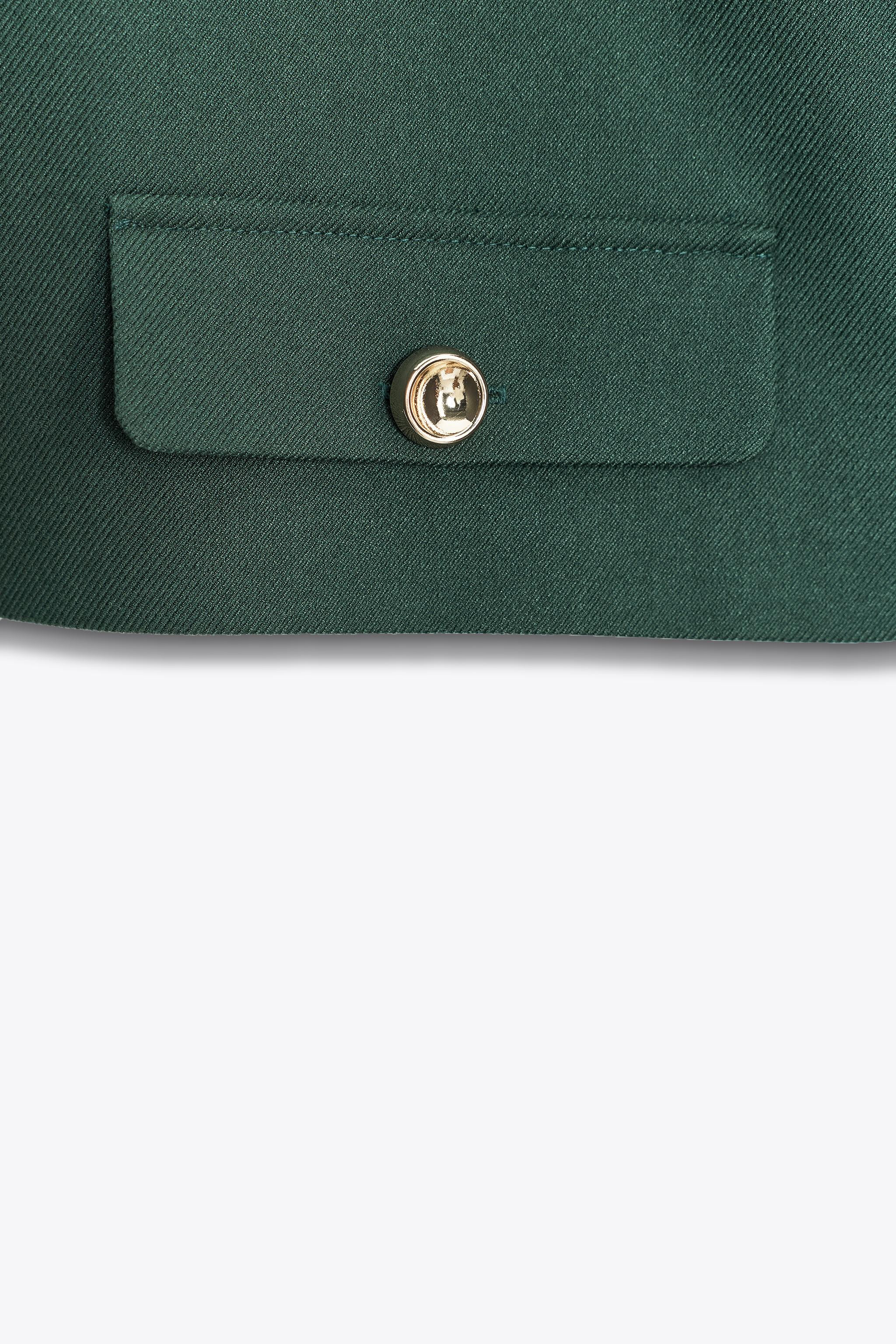 SHORT VEST WITH FLAPS | Zara US