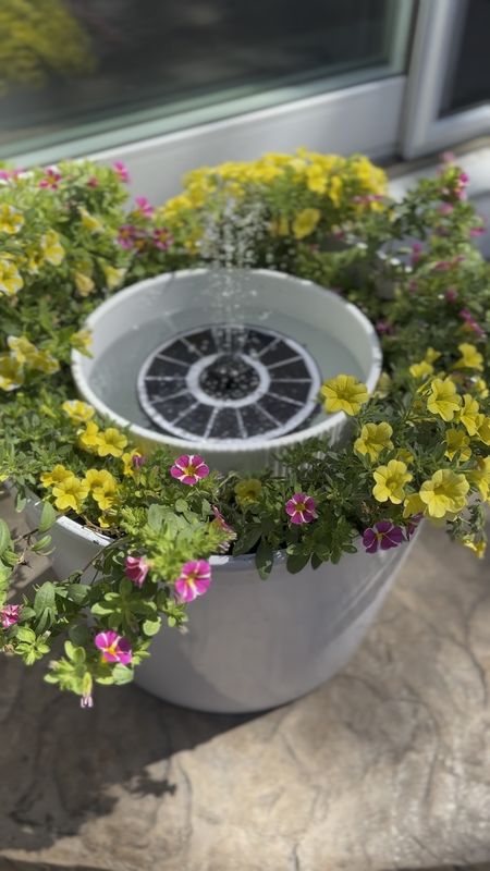 The perfect patio planter DIY project for Memorial Day Weekend featuring a led solar light fountain to highlight those beautiful flowers at night. 

MDW projects, DIY Patio planter, pool deck decor, summer projects, planter, patio decor, outdoor accents

#LTKHome #LTKFindsUnder50 #LTKSeasonal