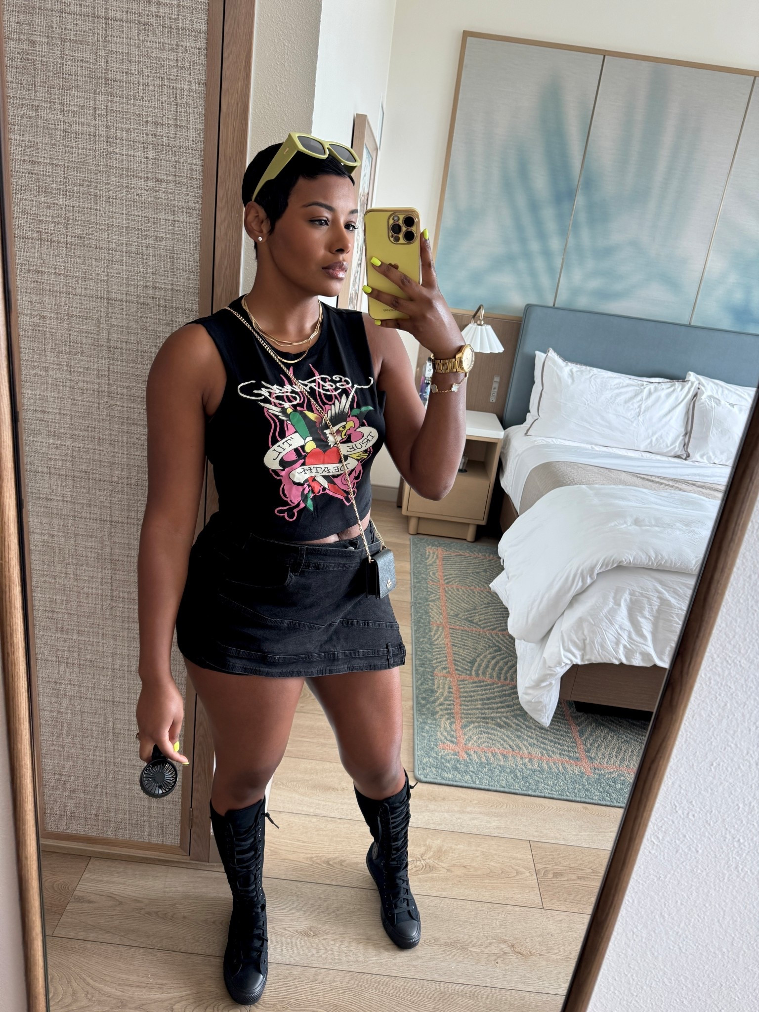 Headed to the #BreezyBowl. The goal was to give early 2000s…now as far as these converse I just had to have em plus I wasn’t going to wear heels at alllllll.

**This Ed Hardy shirt I cut the sleeves off. 

#LTKStyleTip