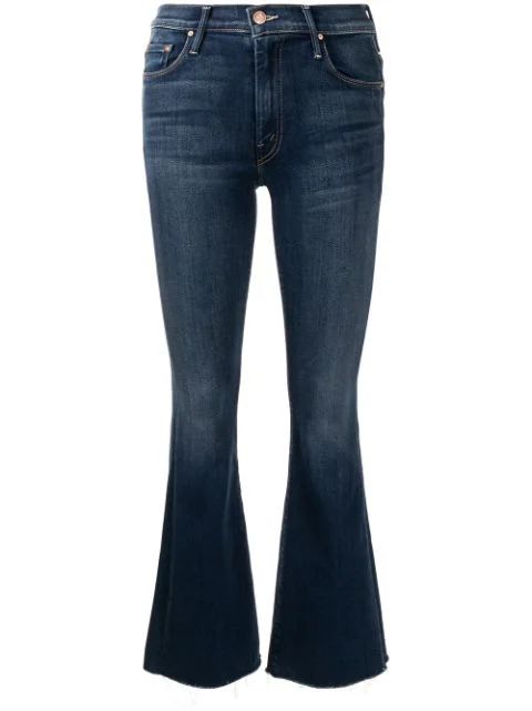The Weekender flared jeans | Farfetch (US)