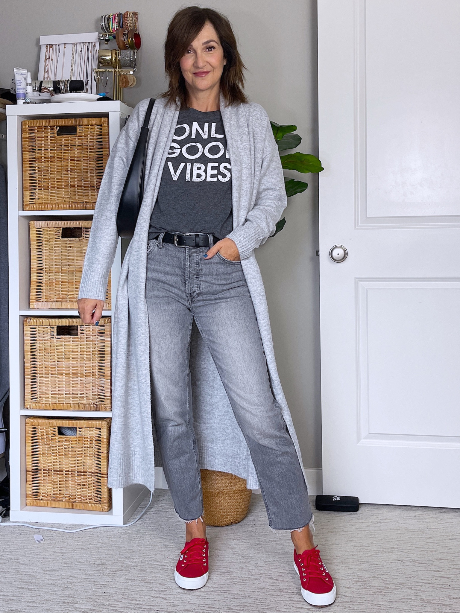 Fall outfit idea, all grey and a pop of red 
My tee is old from Target but everything else is linked.
I’m 5’ 7” size 4 wearing XS/S in the long cardigan, it’s a roomy fit (and so soft!).
Jeans fit tts, I’m wearing size 27. Also wearing my usual size in the sneakers.
No show socks are the best, they don’t slide down!
My lip color is the Tarte lip crème in mulberry 

#LTKstyletip #LTKshoecrush #LTKitbag