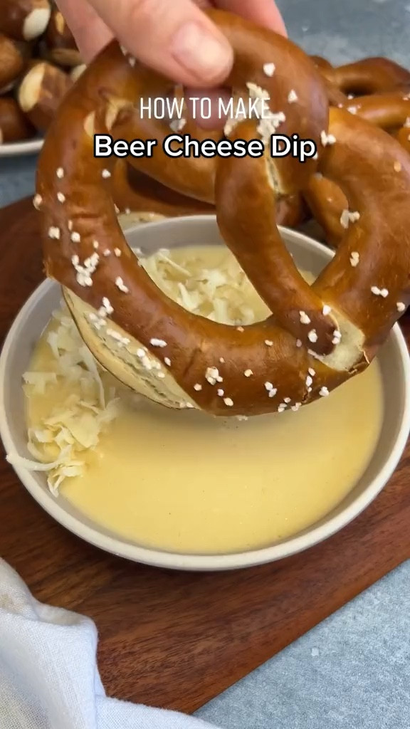 Beer cheese is America’s answer to Fondue: it’s melty, delicious, and makes just about anything taste better. 

Ingredients
* 1/4 cup unsalted butter
* 1/4 cup all purpose flour
* 3/4 tsp garlic powder
* 3/4 tsp onion powder
* 1/2 tsp mustard powder
* 1/4 tsp Worcestershire sauce
* 3/4 cup milk
* 1 cup beer of your choice
* 2 cups grated cheddar
* 1 cup grated gruyere
* Pretzels for serving

Instructions 
* In a medium saucepan, melt the butter over medium-high heat. Add the flour and stir constantly until a wet, sand-like texture forms, 3-5 minutes. Stir in the garlic powder, onion powder, mustard powder, and Worcestershire sauce; cook for another 30 seconds. Add the milk and beer and whisk until smooth. Bring to a simmer and cook until thickened, 30-60 seconds more. 
* Add a third of the cheddar and gruyere cheeses; whisk until melted and fully incorporated, about 1 minute. Repeat with remaining cheese. 
* Serve in a bowl with pretzels on the side for dipping. 

#LTKSeasonal #LTKfoodie