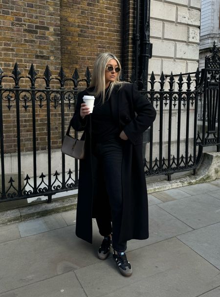 All black outfit 
Long maxi black coat 
Black jeans 
Black samba 
Hexagon Celine Sunnies 
Le 5 Á 7 ysl bag 

#LTKSeasonal #LTKstyletip #LTKeurope