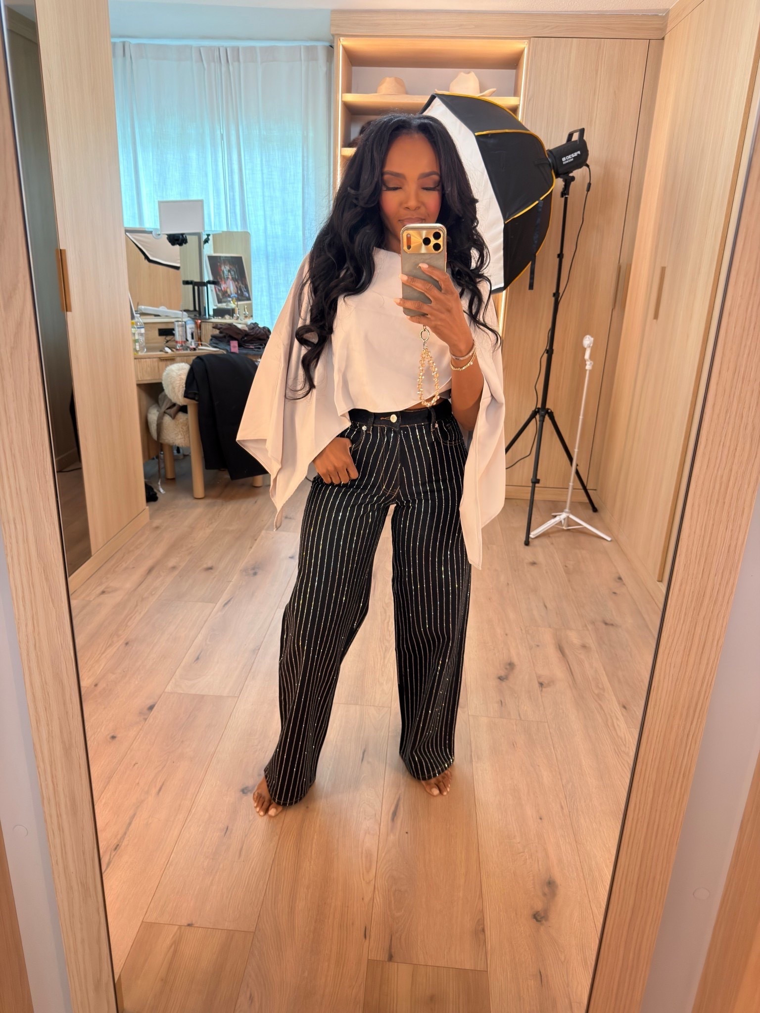 An elevated play on proportions — the crisp white cape-style top paired with sparkled pinstripe trousers creates a modern, clean silhouette that feels effortlessly chic. The structured drape adds soft drama, while the subtle shimmer in the pants gives just enough detail to make this look stand out without feeling overdone.

Perfect for dinner dates, elevated daytime plans, and holiday gatherings.

📏 Sizing: Small
Height — 5’4” | 138 lbs | Bust — 34D | Waist — 27” | Hips — 40”
Pants/Jeans — 27 Long or 4 Long

chic pinstripe trousers, cape-style top outfit, elevated neutral looks, modern holiday styling, subtle sparkle outfit ideas, polished everyday fashion

✨ Everything linked below for easy shopping

Follow me on Instagram and YouTube @kirasfashionfinds

#LTKootd #LTKPetite #LTKHoliday