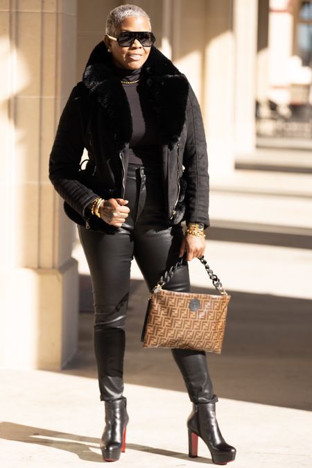 All Black Winter Outfit.  Faux coat and turtle neck shirt from Amazon, Black faux pants from Express, Louboutin Boots, Fendi Pouch, Givenchy Shades  

#LTKitbag #LTKover40 #LTKSeasonal