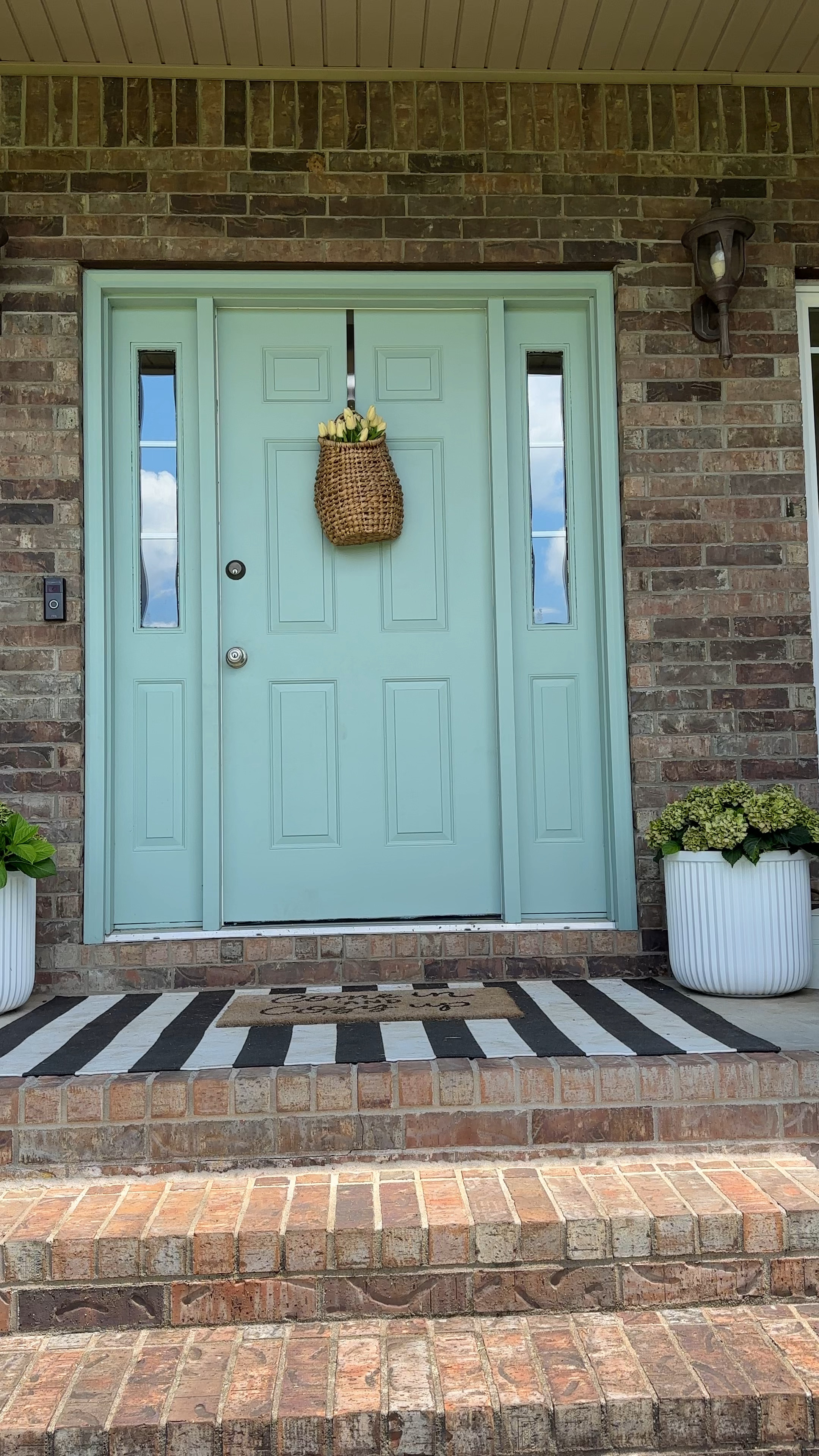 Front porch refresh!! 👍🏼 Walmart & Amazon home finds for the win! 

Outdoor furniture, patio chairs, door mat, rocking chairs from Walmart, modern rocking chairs, modern outdoor furniture, door wreath & hanger, viral Walmart planters, striped outdoor rug, door mat, modern white fluted planters, hanging basket, ring video doorbell

#LTKSeasonal #LTKHome #LTKVideo