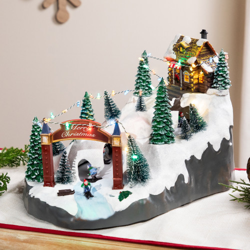 LED Lighted Winter Skiing Scene Animated Christmas Village Display - 15" | Christmas Central
