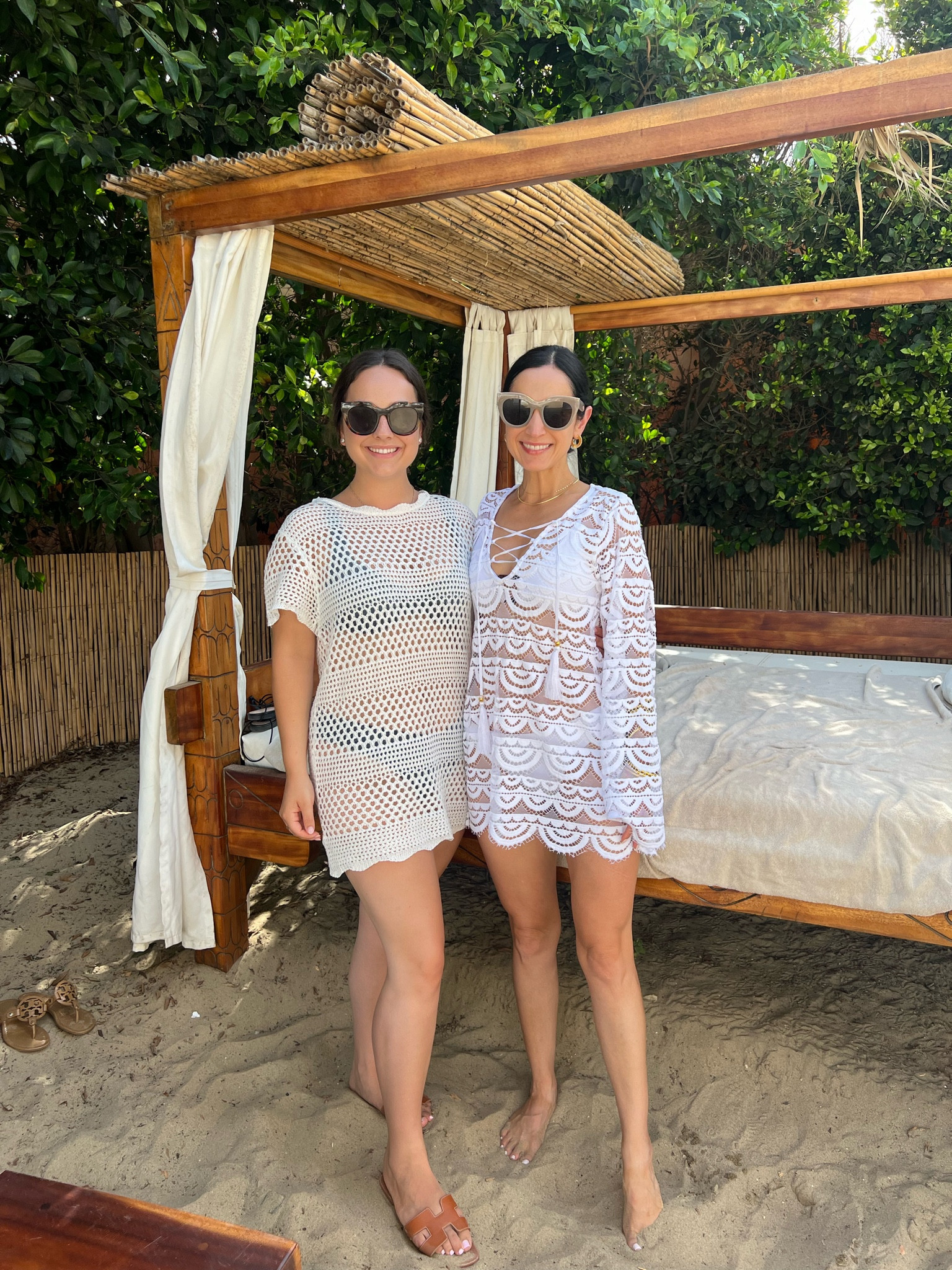 Chic white cover ups we wore in Spain!🤍 Marisa’s short sleeve style is under $30! Wearing small in the short sleeve, XS/S in long sleeve style 

#LTKSwim #LTKTravel #LTKOver40