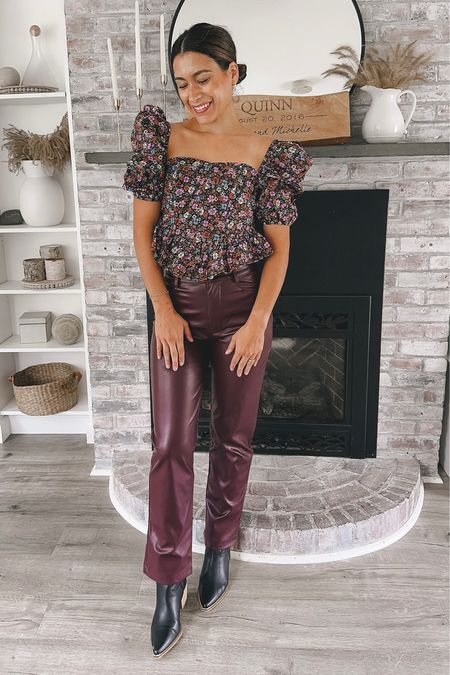 Holiday outfit idea with burgundy faux leather pants and floral top from buddy love 

#LTKparties #LTKHoliday #LTKfindsunder100