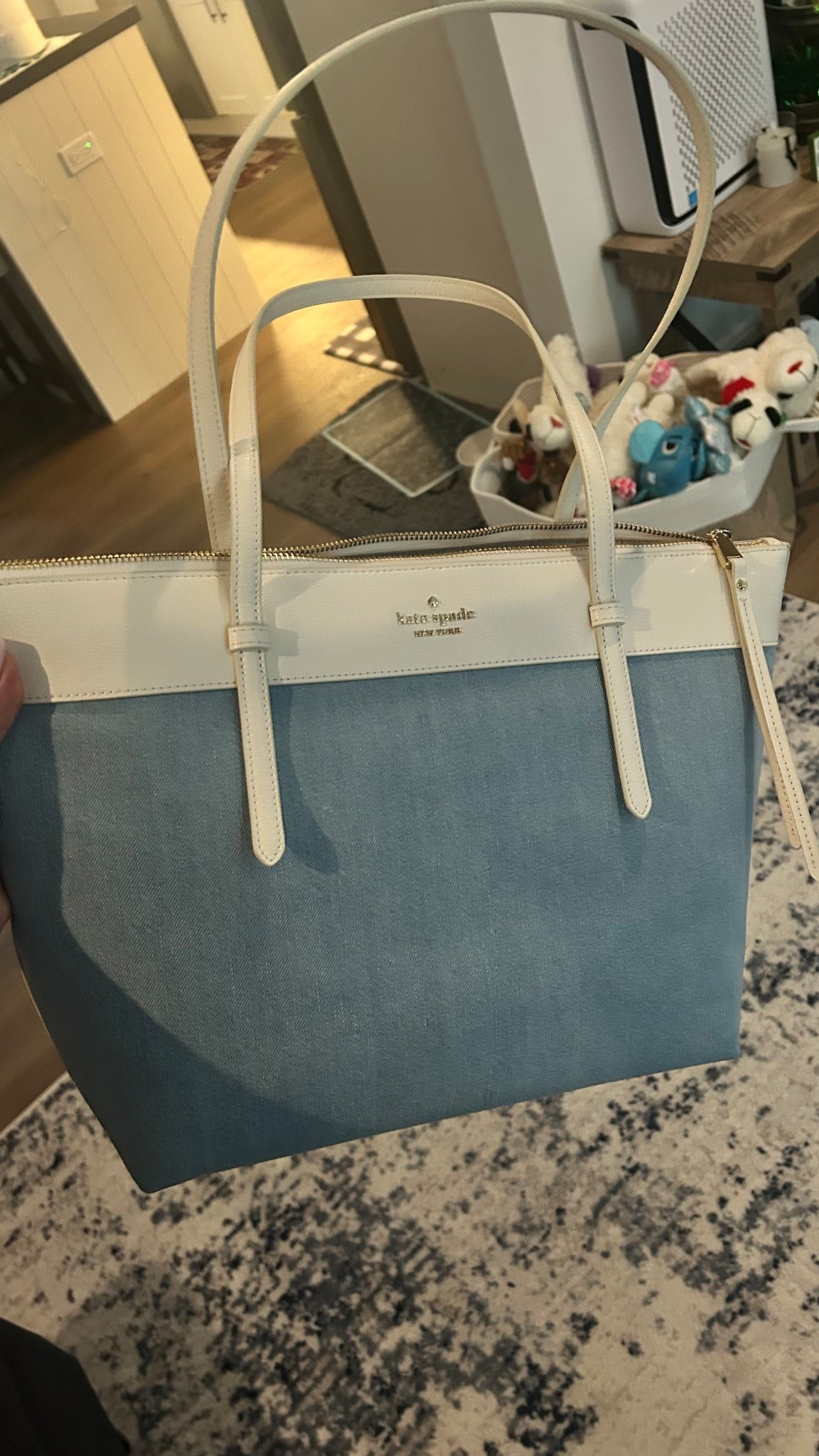 Your spring carry-all just arrived 🤍👖 Obsessed with this Kate Spade denim tote — the cream leather trim and gold hardware make it feel so elevated. It’s giving casual luxury and I can’t stop reaching for it. Linked below! 🛍️ on sale now! Grab the wristlet and bag for under $160!!!! 😍

#LTKselfcare #LTKSpringSale #LTKmomlife