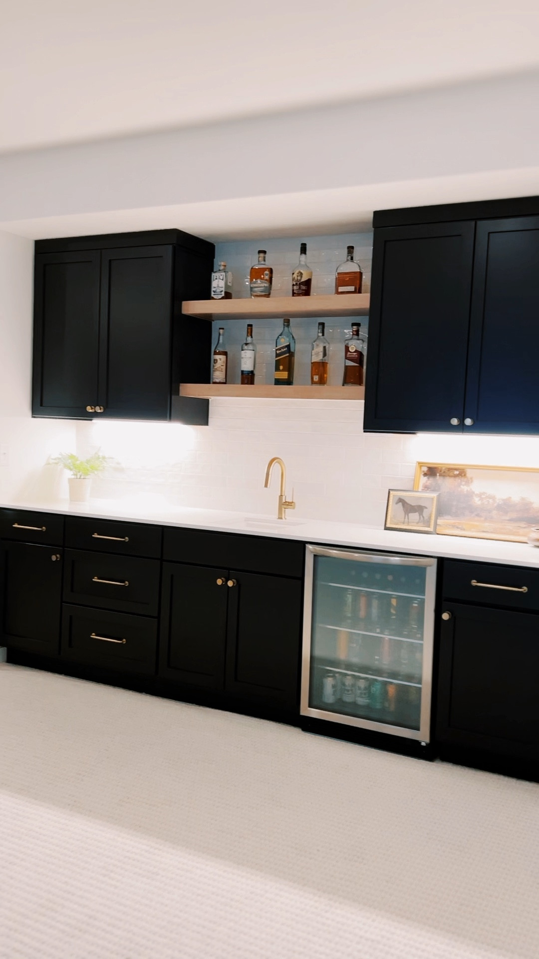 Finding the right jewelry for your cabinets is sometimes the hardest part. Love how this  tile and hardware make our black wetbar really stand out.

#LTKhome #LTKstyletip