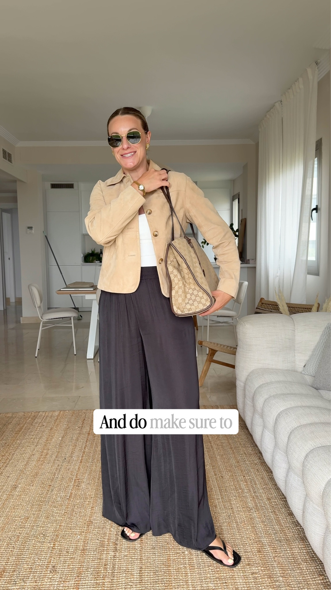 Black wide leg satin style trousers, Suede jacket, spring outfit idea, mid-size outfit idea, Zara top, Zara trousers, leather sandals, Gucci tote bag, Rayban

#LTKspring #LTKuk #LTKmidsize