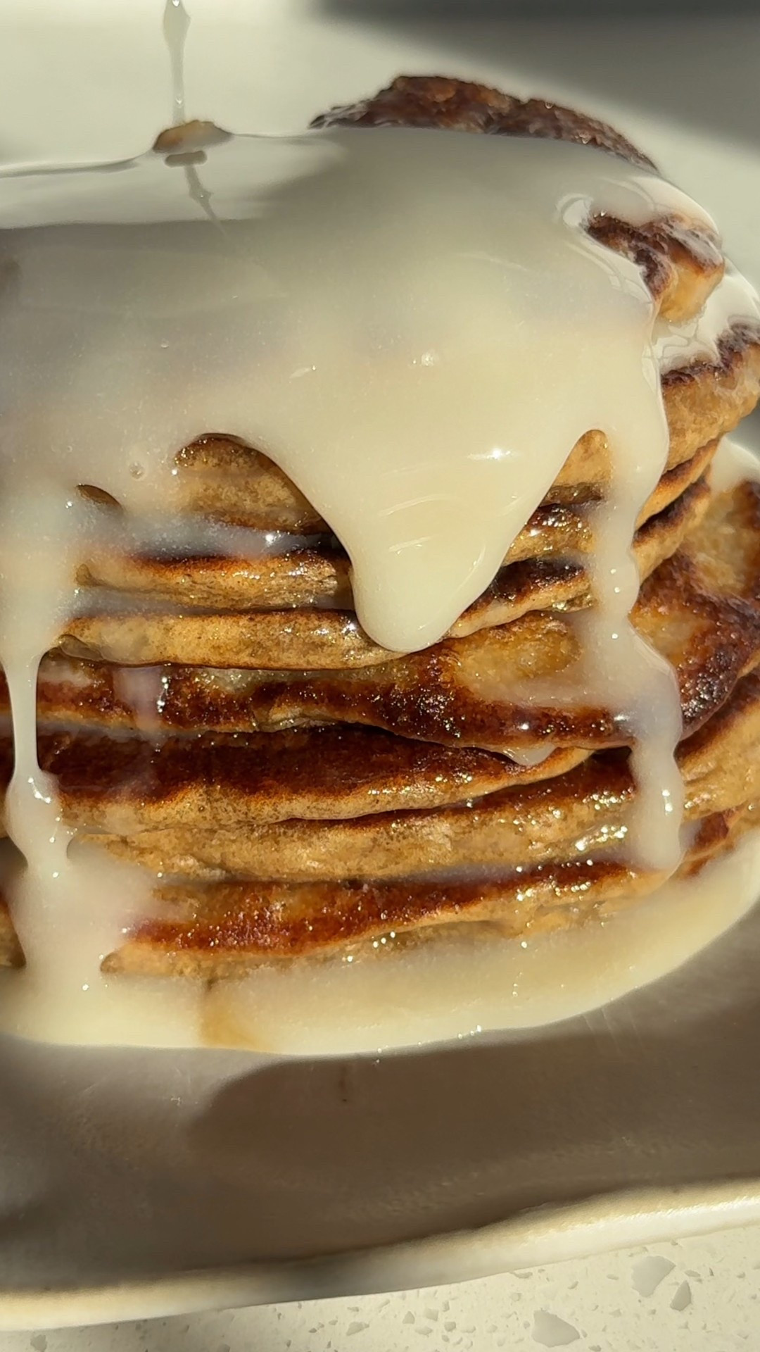 #ad I’ve partnered with @chobani to bring my Blender Gingerbread Pancakes made with Chobani Greek Yogurt — crafted from only natural ingredients. I’ve linked all my favorite Chobani products in my LTK shop so it’s easy to grab what you need. Comment LINK and I’ll send it right over! . @Shop.LTK #liketkit  https://liketk.it/5GYBB @Target @Chobani, #TargetPartner #Target #Holidayrecipes #Healthyrecipes #eatclean 

Blender Gingerbread Pancakes 
1 ¼ cup old-fashioned rolled oats, gluten-free
¾  cup Chobani whole milk Greek Yogurt (plain)
½ cup unsweetened vanilla almond milk
1 egg
2 teaspoons vanilla extract
3 tbsp protein powder
2 ½  teaspoons baking powder
½ tsp baking soda
1 tbsp powdered sugar
1 tbsp molasses
¼ teaspoon salt
Glaze
1 cup powdered sugar
1 tbsp Chobani Vanilla Greek Yogurt
1 tsp unsweetened vanilla almond milk 
½ tsp vanilla extract

Instructions:
Blend it up: Add all ingredients to a high-speed blender. Blend on high until the batter is smooth and pourable, about 30–45 seconds.
Rest the batter: Let the batter sit for about 10-15 minutes to thicken slightly. 
Cook the pancakes: Heat a nonstick skillet or griddle over medium heat and lightly grease with butter or coconut oil. Pour about ¼ cup of batter per pancake.
Flip & finish: Cook until bubbles form on the surface and the edges look set, about 2–3 minutes. Flip and cook another 1–2 minutes until golden and cooked through.
Make Glaze: In a small bowl, whisk together the powdered sugar, Chobani Vanilla Greek Yogurt, milk, and vanilla extract. Stir continuously until the sugar fully dissolves and the glaze becomes smooth and glossy, this may take about 30–40 seconds. If still too thick add another 1 tsp milk. Drizzle over warm pancakes and enjoy!