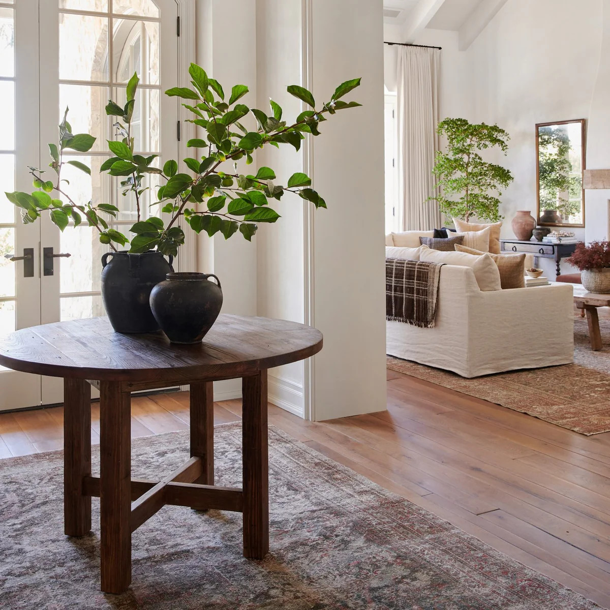 X Base Round Dining Table | Shoppe Amber Interiors | Amber Interiors