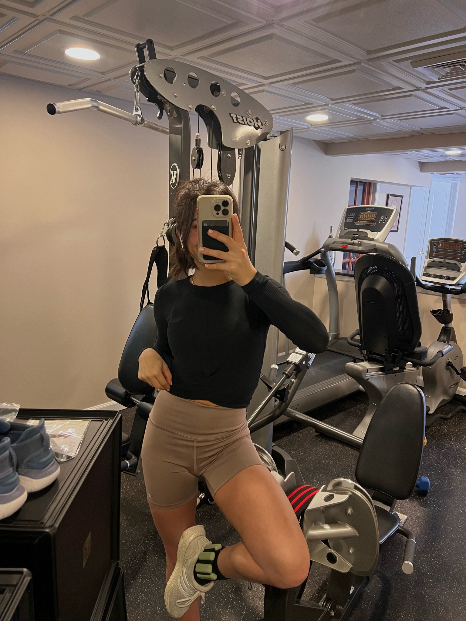 high quality activewear/everyday workout pieces. black long sleeve and tan/nude biker shorts! favorite alo pieces 💘