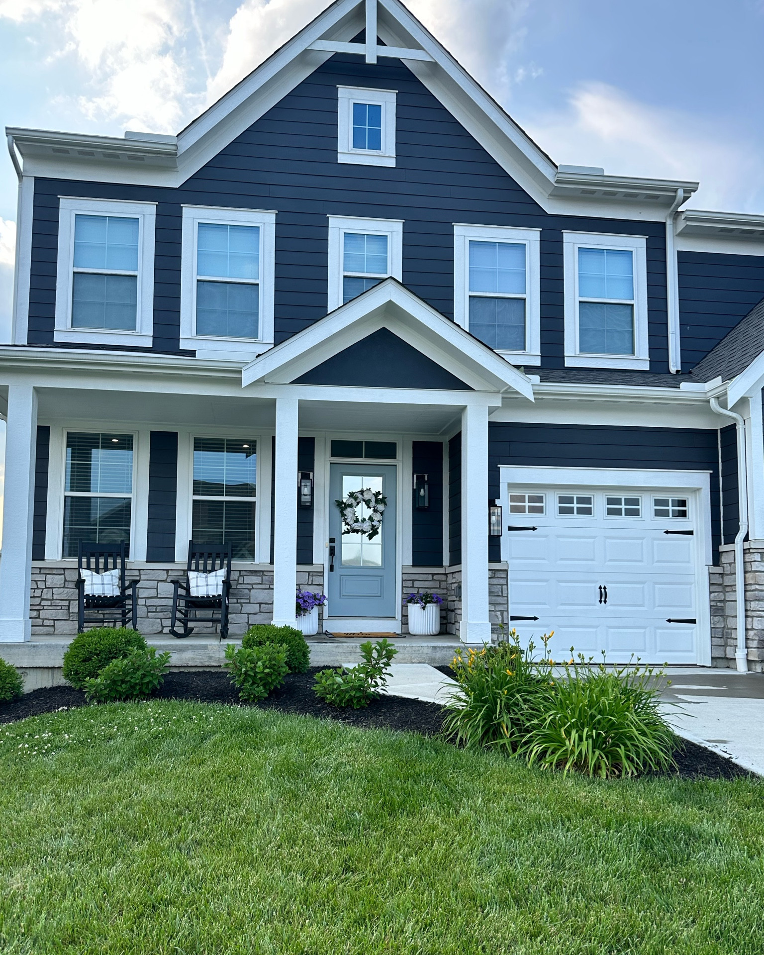 Garage door, garage door magnets, rocking chair, outdoor pillow, planter, curb appeal, front porch furniture, porch decor 

#LTKhome #LTKSeasonal