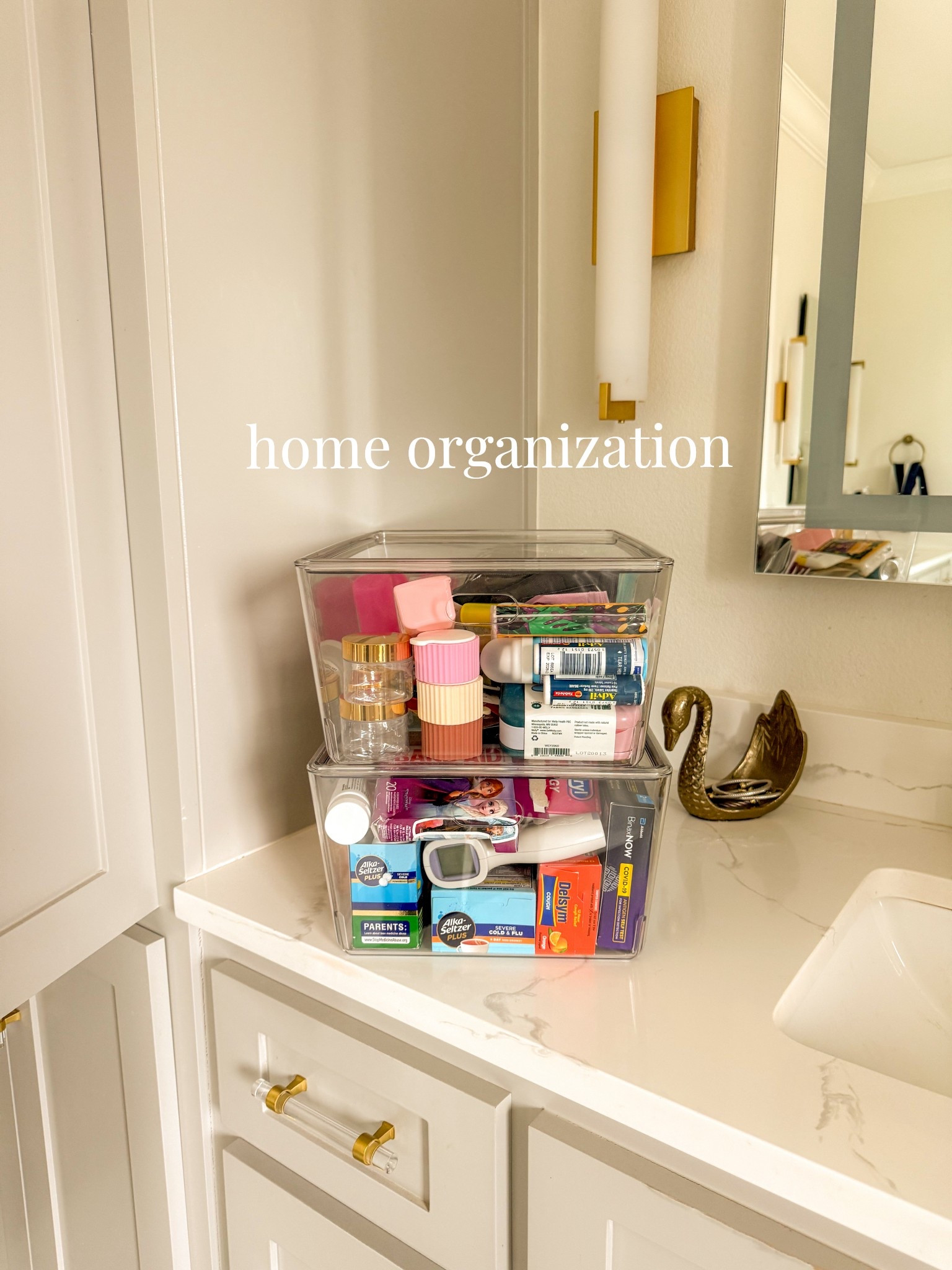 I love these clear stackable bins for bathroom and kitchen organization. The lids aren’t tight fitting but allow them to stack and see everything inside! Here I made a travel size/ and purse restock container filled with on-the-go size items and one for some of our wellness supplies that used to be tossed (and lost) in drawers and shelves. 

home organization ideas, organization tips, bathroom storage and organization, home inspo, apartment organization, storage bins 

#LTKHome #LTKBeauty