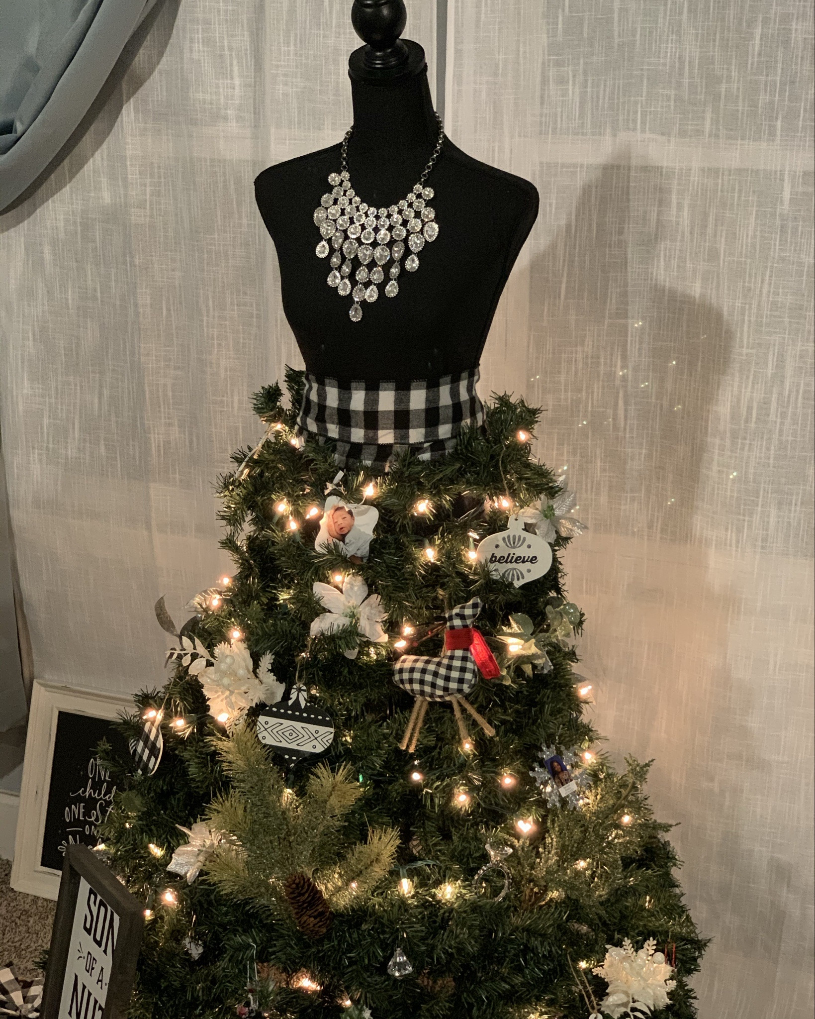 Throwback to our mannequin Christmas tree we lovingly named Tree-shelle 🎄✨
She was made using a dress form, 12”, 18” & 24” wire wreath frames, 4 to 5 bundles of 6-9ft garland, floral wire, wire cutters and a whole lot of creativity.

I started at the mannequin’s waist, securing wire as a base, then layered the wreath forms from smallest to largest—letting each one hang vertically to create the tree shape. From there, it was all about wrapping, fluffing, and decorating until she came to life.

Proof that a little imagination (and some wire) can turn into a holiday statement piece ✨#DIYChristmas #CreativeHome #HolidayDecor #LTKFinds#LTKHoliday

#LTKHome