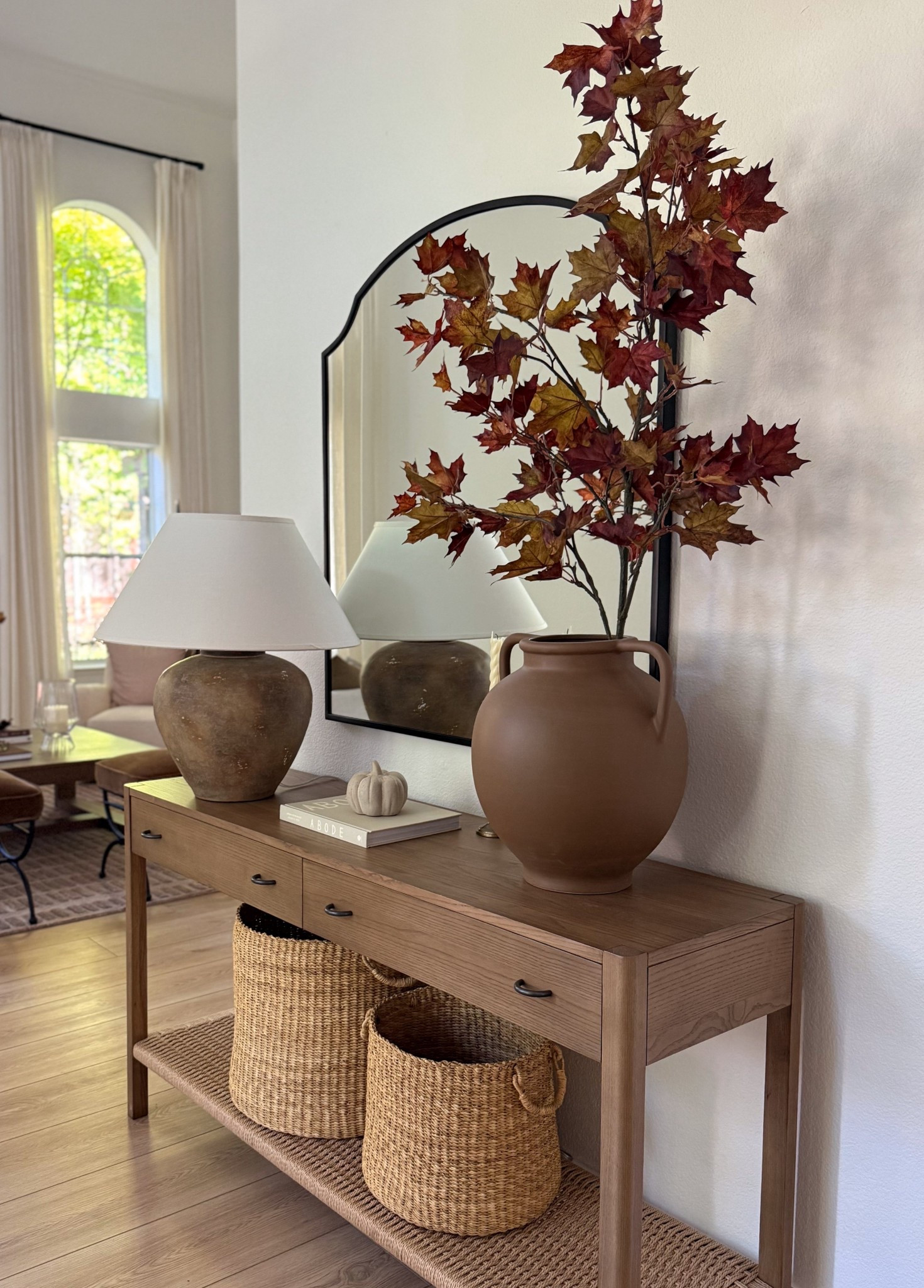 Entryway styling for fall 🍁
This favorite fall stem is on sale and just one is enough to fill a large vase for a minimalist and elevated look. The brown vase makes such a statement and is worth the splurge. The lamp completes the look and blends beautifully with my earthy organic decor.

Console table decor, fall home decor, entryway decor, modern organic decor  

#LTKHome #LTKSeasonal #LTKSaleAlert