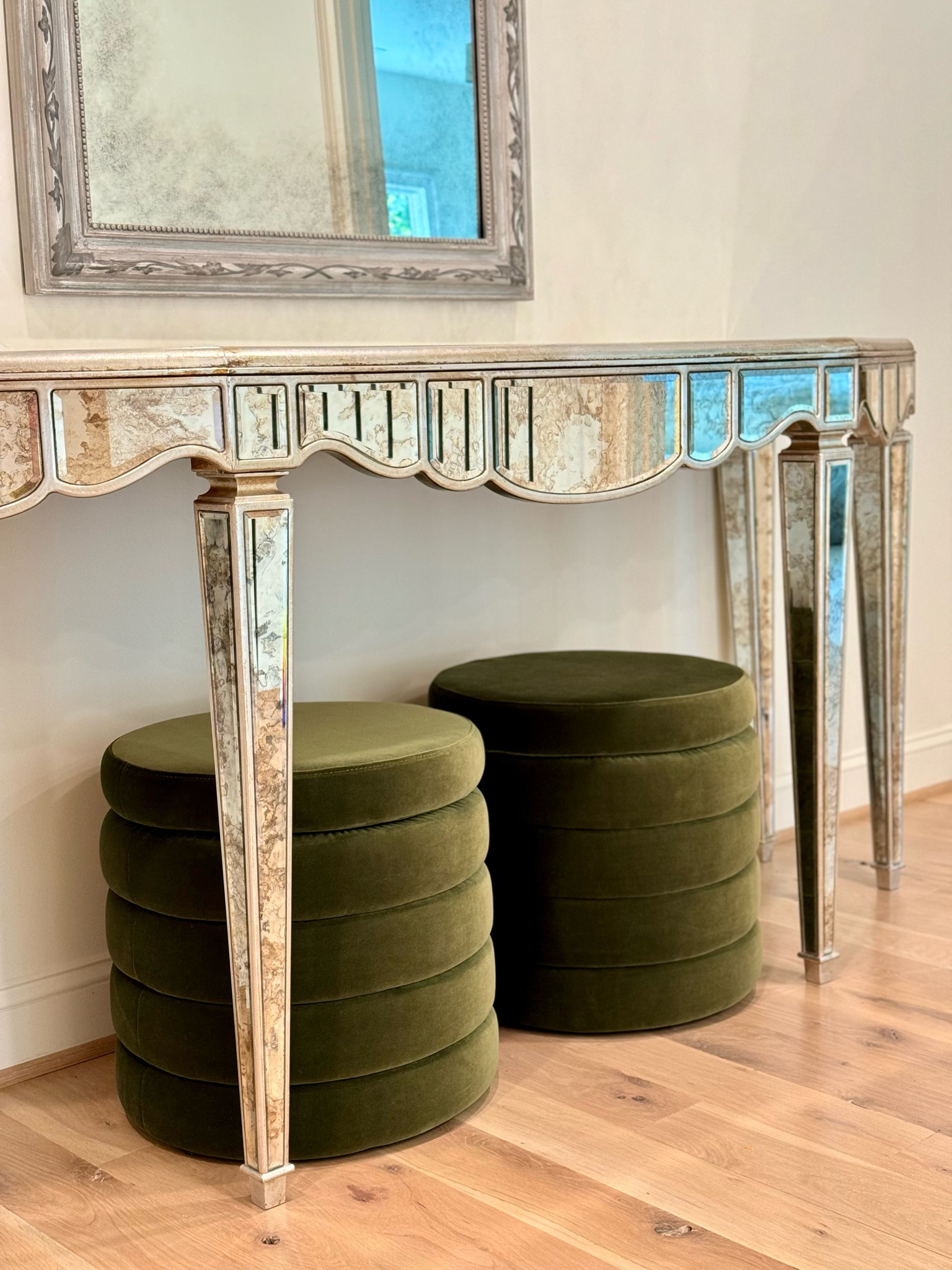 Pop of color meet secret storage! How great are these plush, velvet ottomans?! I needed something to bring this mirrored table to life and I love all the warmth and interest they add. Plus having somewhere else to cram a dozen puzzle boxes doesn’t hurt. 😉

#LTKSaleAlert #LTKHome
