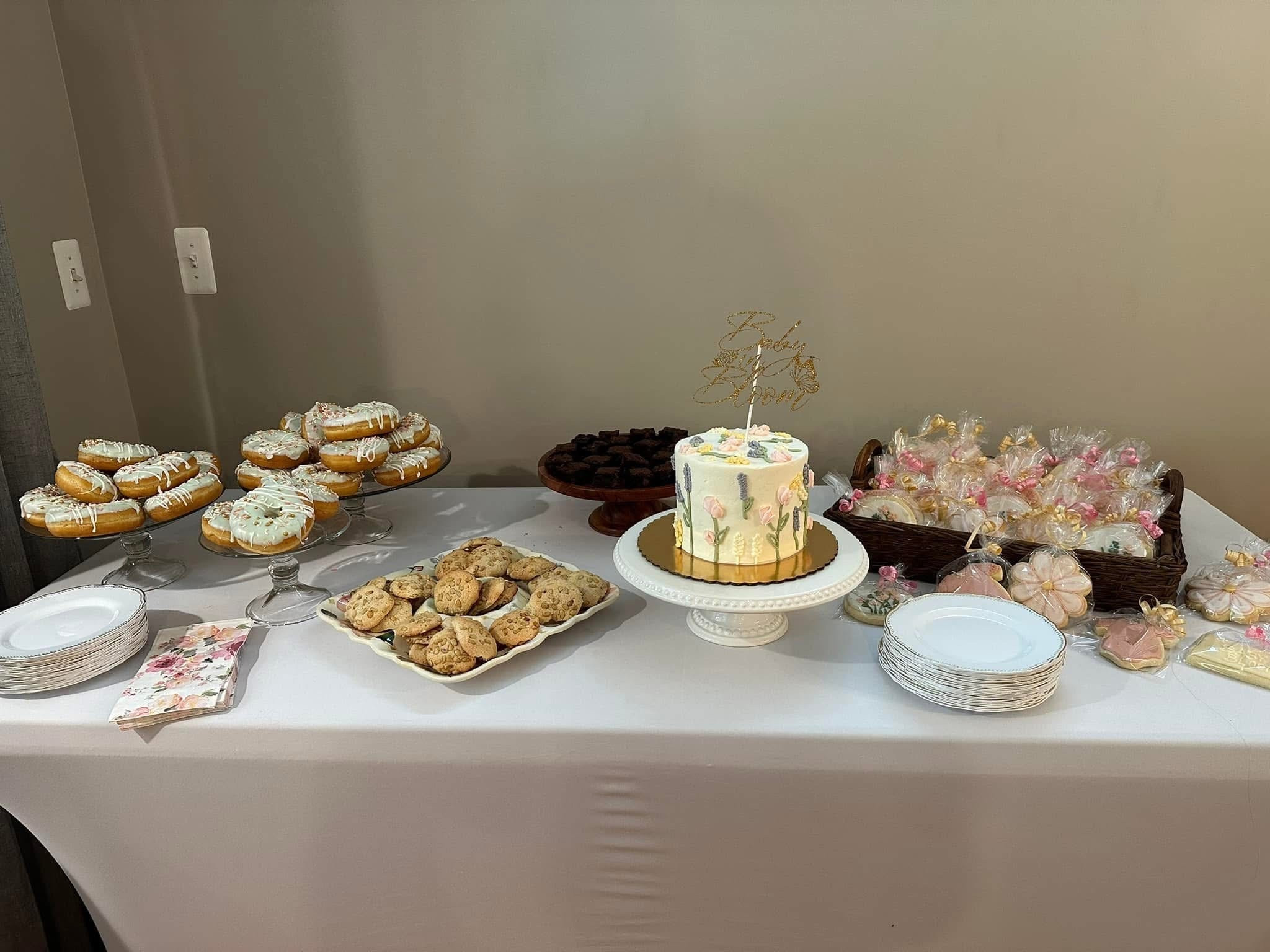 Dessert table at my baby in bloom baby shower. Kept it simple and had donuts, cookies and cake

#LTKBump #LTKParties #LTKBaby