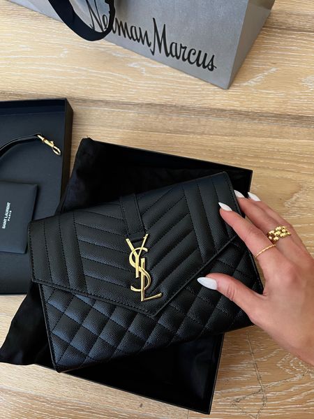 YSL envelope clutch 
Designer bags 
YSL bag 
Black purse 
Gold ring 
Gold jewelry 
Waterproof jewelry
Fall purse 
Fall outfit 
Boots 
Black jeans 
Oversized coat 
Faux leather pants 


 

#LTKSeasonal #LTKworkwear #LTKitbag