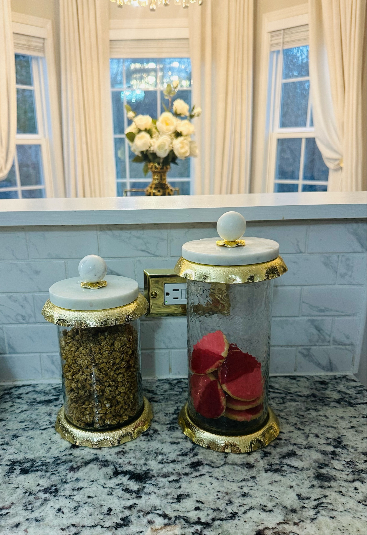 Glass canister jar with marble lid.

#LTKHome