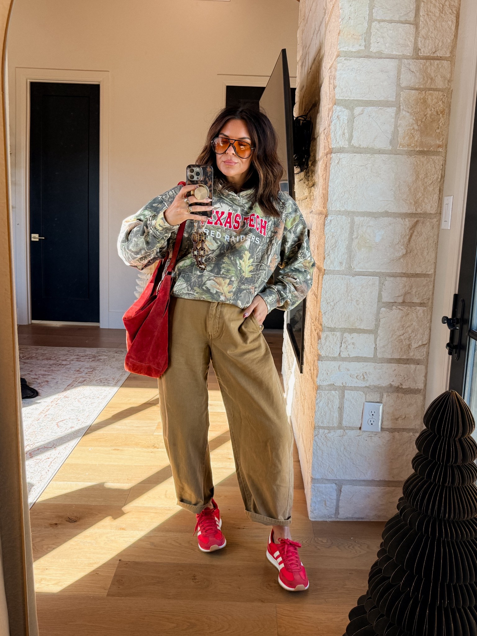 Sweatshirt is from Red Raider Outfitters 
Gap barrel pants: TTS
SNEAKERS: TTS


#LTKmomlife #LTKMidsize #LTKFindsUnder50