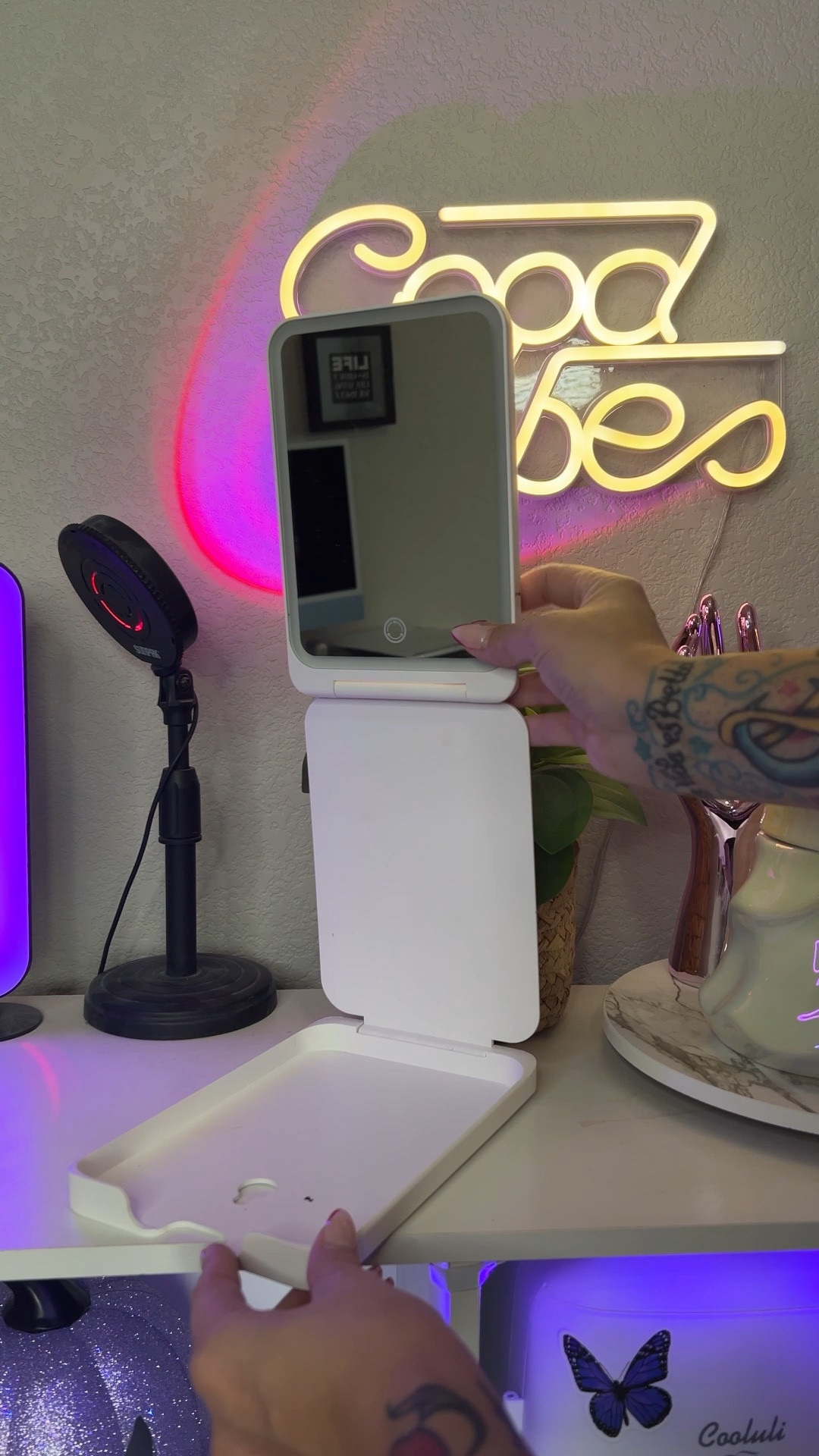 Folding travel mirror with LED lights on front mirror, and magnifying mirror on the back.

#LTKTravel #LTKxPrimeDay #LTKFindsUnder50