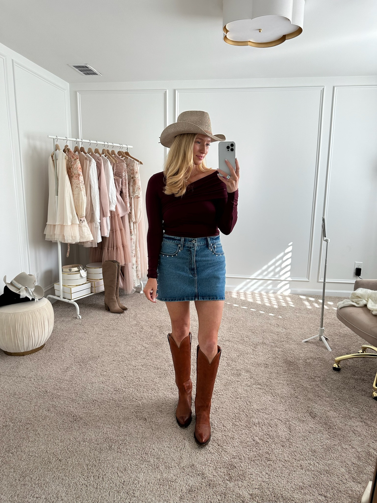 Elevated fall outfit! Would be so cute for a country concert! Both the top and skirt are Abercrombie. Wearing size small in the top and size 27 in the skirt. Fall outfits // western outfits // western boots // denim skirts 

#LTKStyleTip #LTKSeasonal
