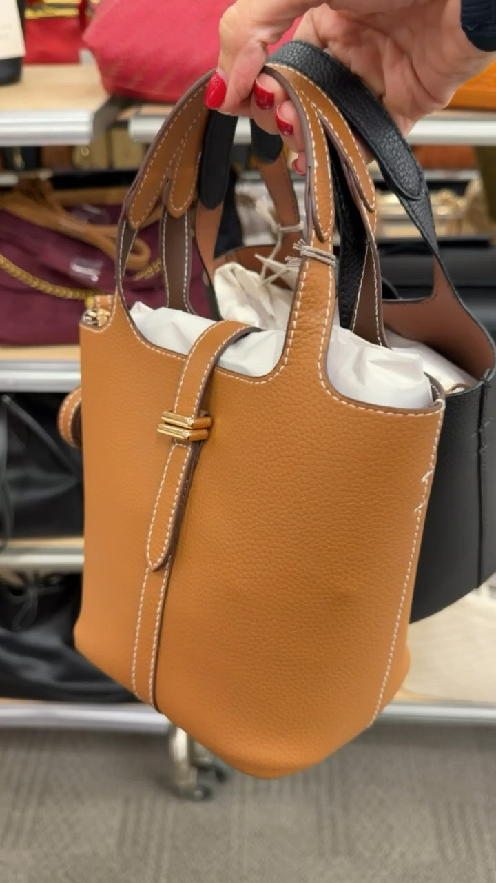 This little top handle bag is such a good everyday size, and I love that it comes in both this warm cognac and classic black. The contrast stitching and structured shape make it feel more expensive than it is, while the crossbody strap keeps it practical.

top handle bag, cognac handbag, black handbag, crossbody bag, structured purse, fall handbag, everyday bag, women’s accessories, fall accessories, affordable handbag, TheMomInStyle

#LTKTravel #LTKdayinmylife #LTKootd