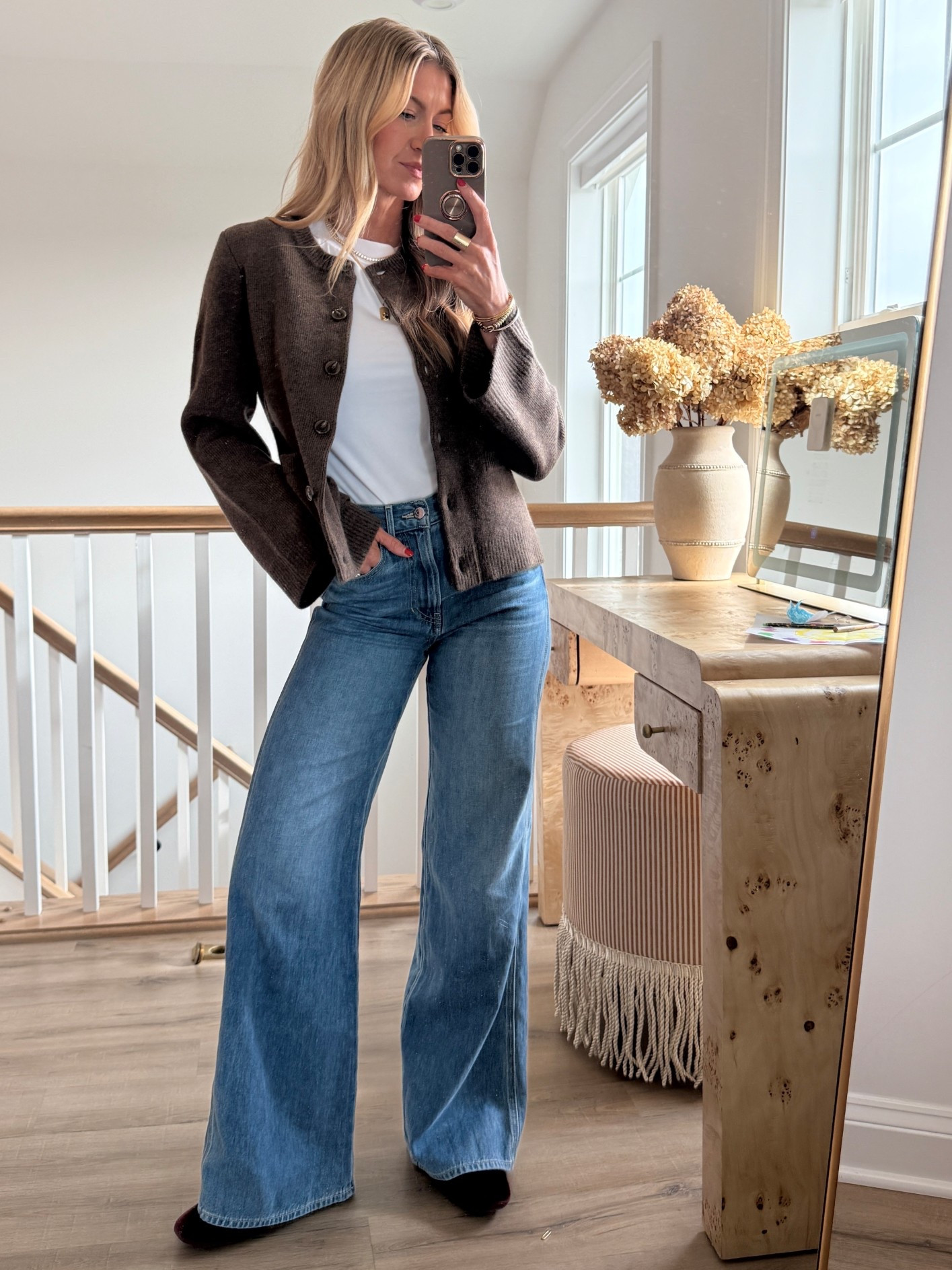 Today’s outfit
Brown Mongolian cashmere cardigan: runs tts, wearing S
White crewneck Tee: runs TTS, wearing S
High rise, wide leg flare denim: ON SALE $200 off, run TTS, wearing 25
Birdies, maroon, velvet, smoking loafers: runs TTS, incredibly cushioned and comfortable. 

#LTKootd #LTKgrwm #LTKmomlife