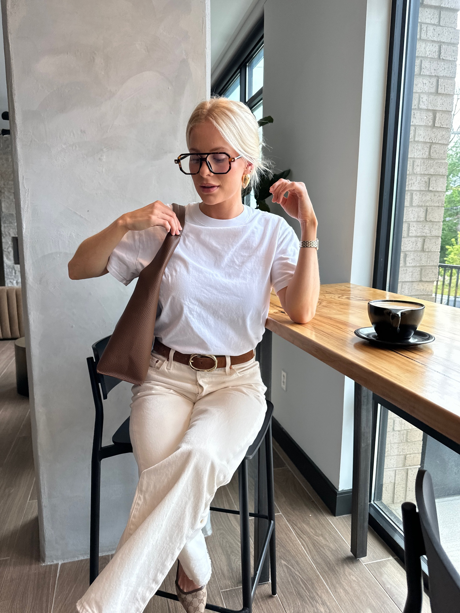 Casual spring outfit! Size small in tee, sized up one size in white jeans for a looser fit, true size in shoes 