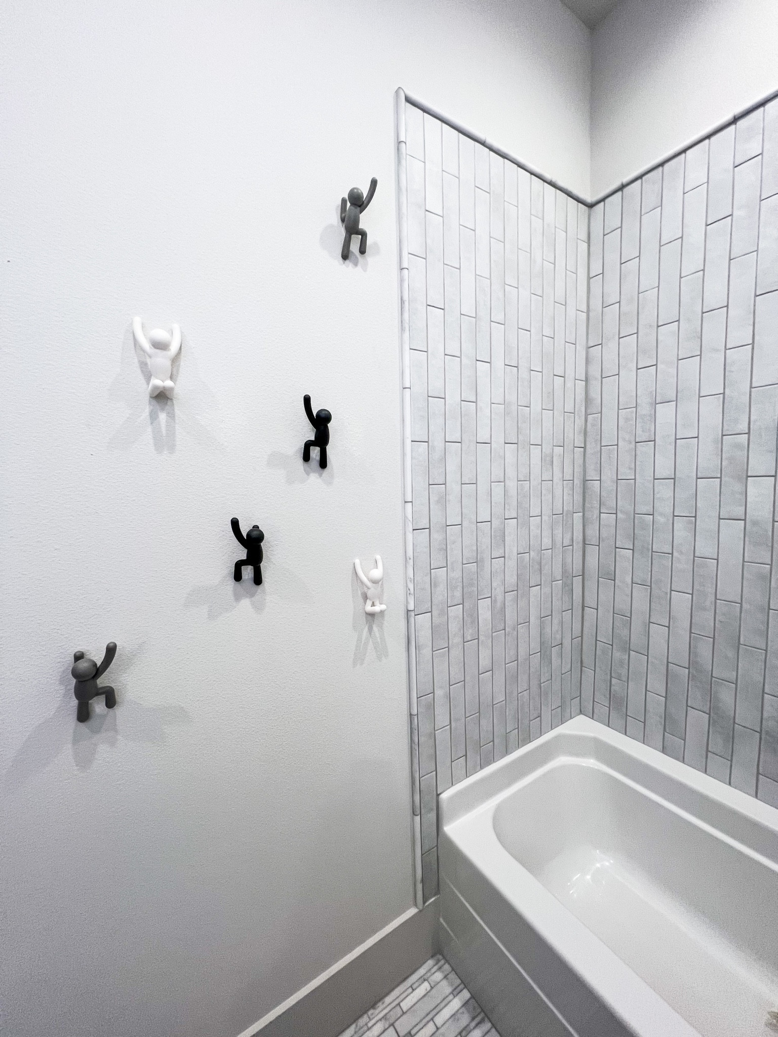 We absolutely love these towel hooks we used in our bunk room bath!  Vertical subway tile and marble floors go right along with these gray and white hooks  

#LTKhome
