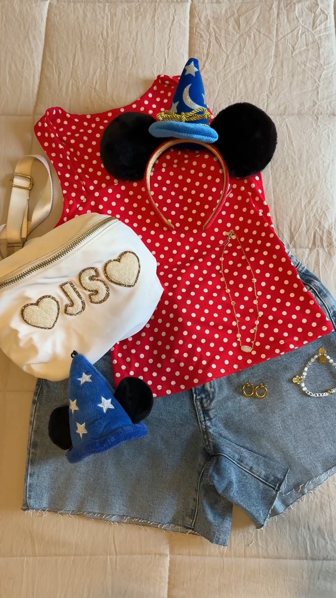 Sorcerer Mickey ootd💙❤️ Disney outfit, Disney outfit inspo, outfit ideas, Disney girl, Hollywood studios outfit, Disney merchandise, Disney aesthetic, Disney style, Amazon fashion, Amazon finds, polka dot top, denim shorts, Stoney clover jumbo fanny pack, Disney bag, Disney jewelry, Disney accessories #disney